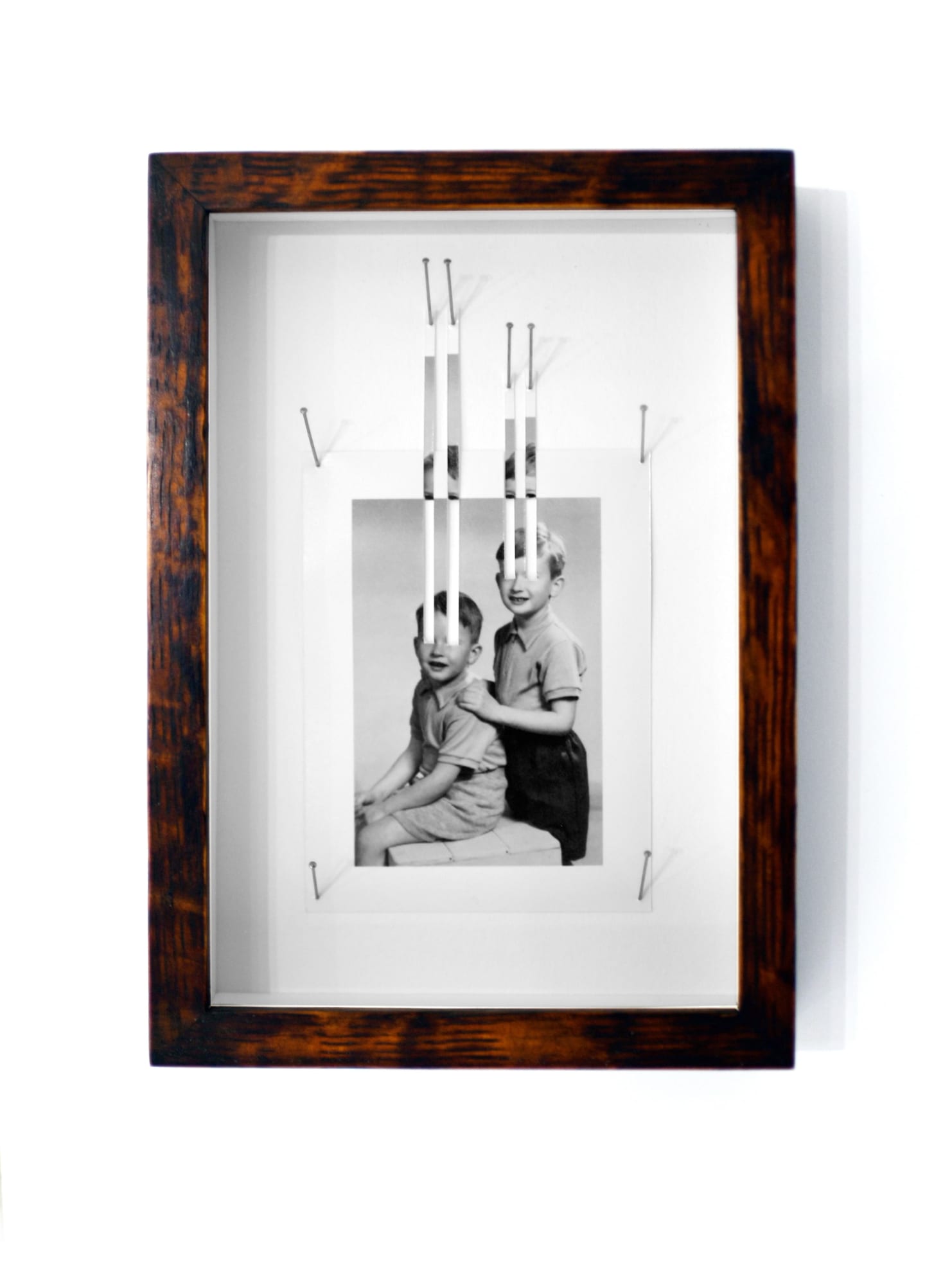 Jonny Briggs, Looking Beyond (cut photographs of artist's father and uncle, 2022