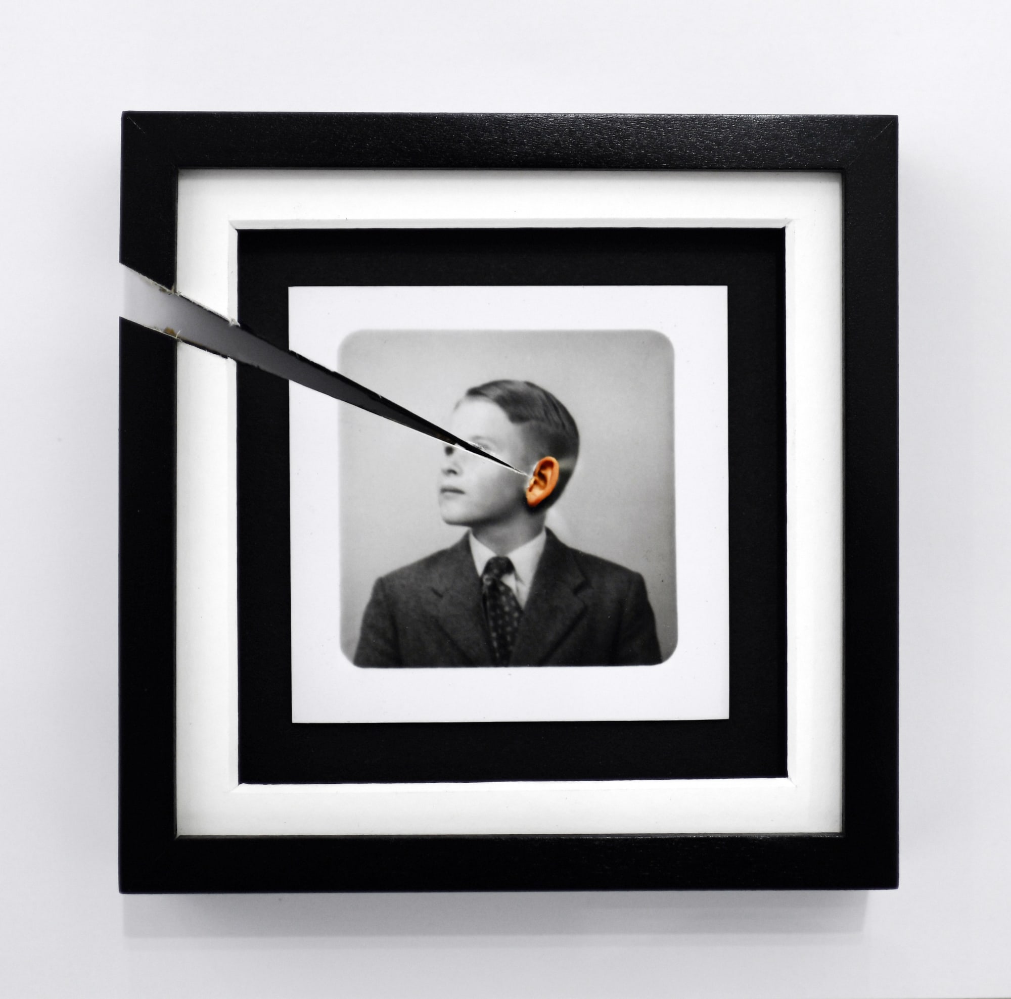 Jonny Briggs, Extramission hearing 2 (artist's ear bursting through print of his father), 2022