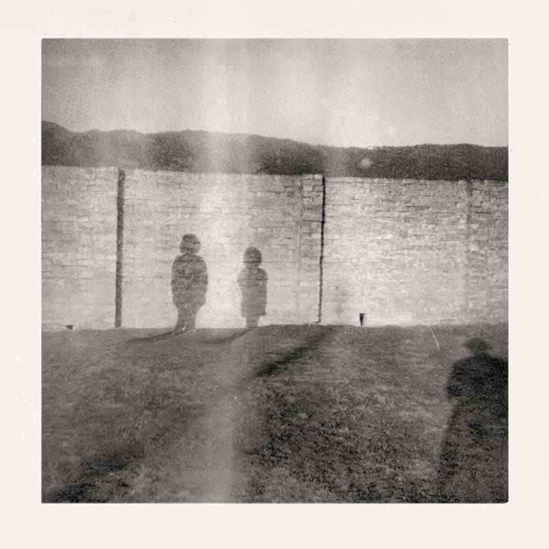 Greg Sand, Traces: Girl Posing by Wall