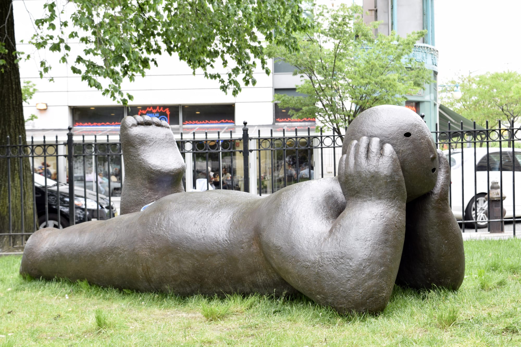 Joy Brown, recliner with head in hands, 2016