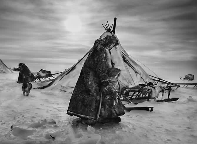 Sebastião Salgado, Nenets, an indigenous nomadic people, whose main subsistence come from reindeer herding, South Yamal Region, Siberia, Russia (Mother and child bundled), 2011