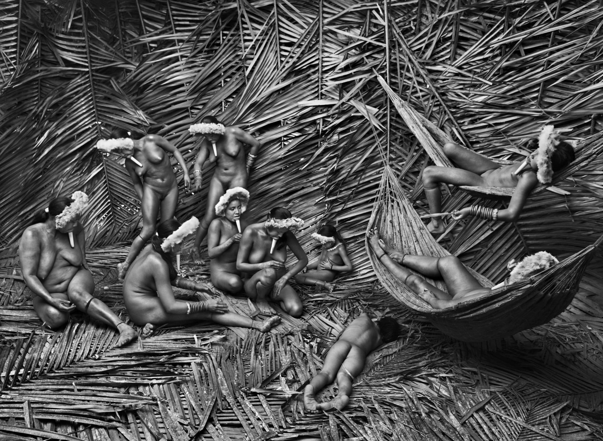 Sebastião Salgado, Zo’é women generally use urucum (Bixa orellana), the red fruit of the urucum plant, to color their bodies. Zo’é Indigenous Territory, State of Pará, Brazil, 2009