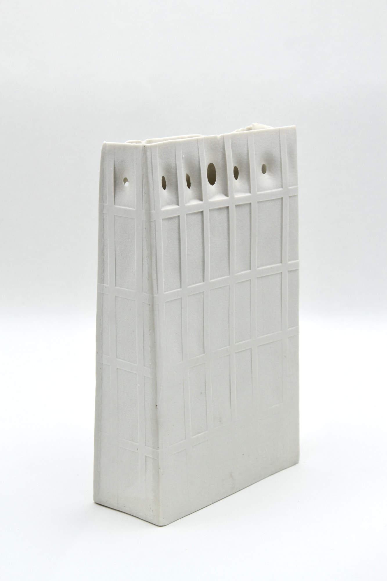 Ella Porter, Porcelain pierced by light grid sculptural vessel, 2024