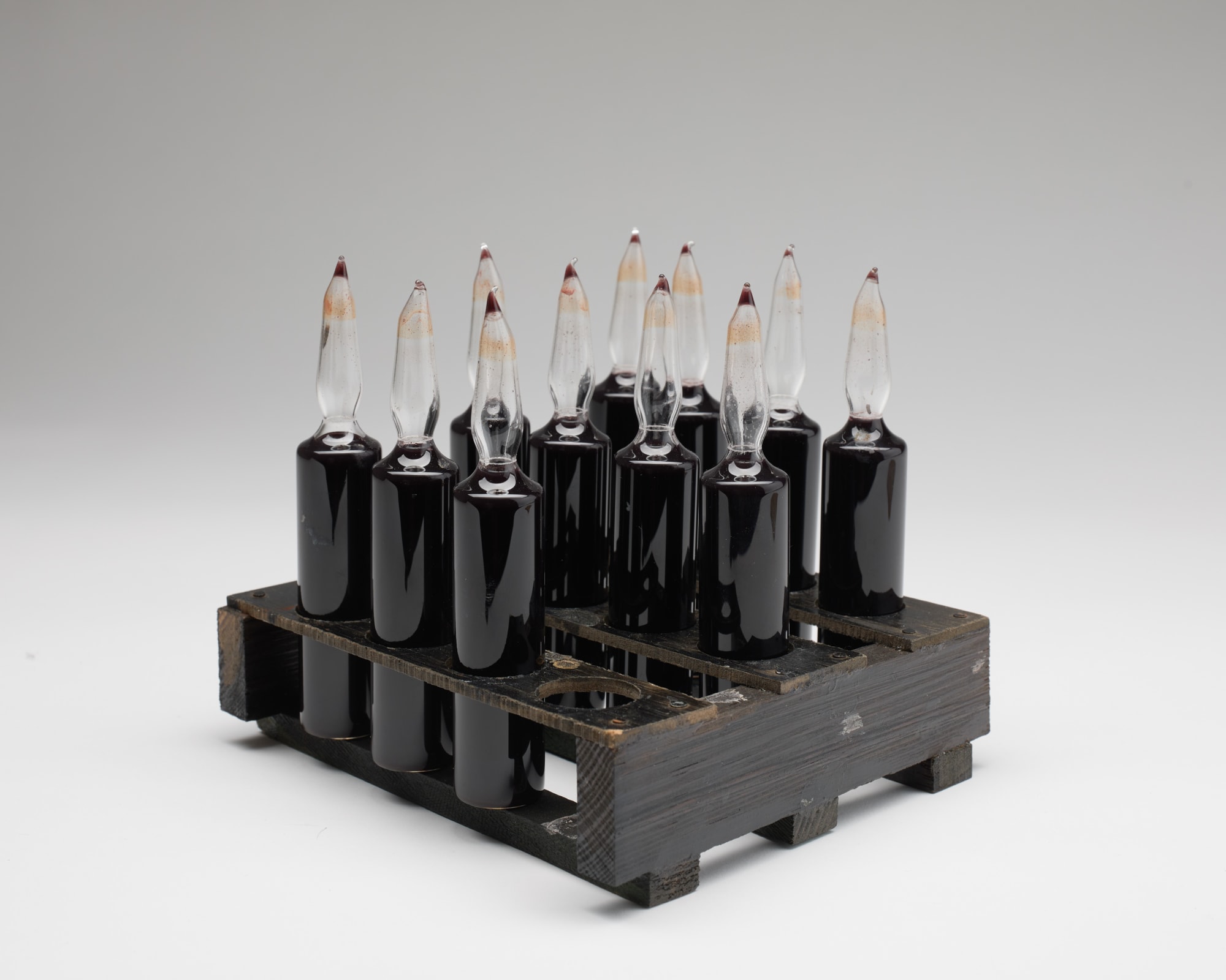 Thomas Little, Dissolved Revolver Sumac Ink Ampule, 2022