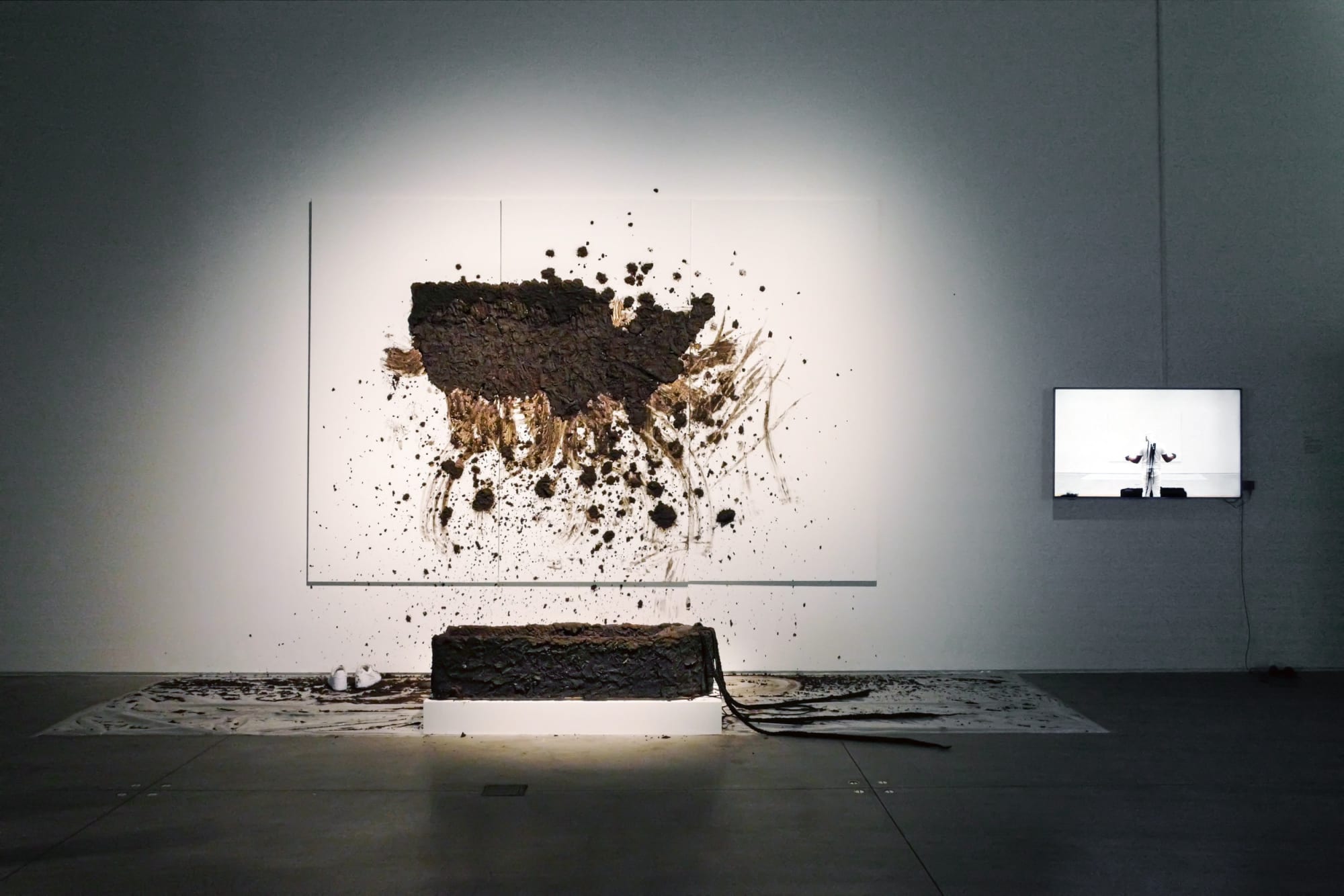 Kiyan Williams Meditation on the Making of America, 2019 Performance, soil, canvas, wood panels Installation view Open Call: Group 2, 2019 The Shed, New York Photography by Lily Wan