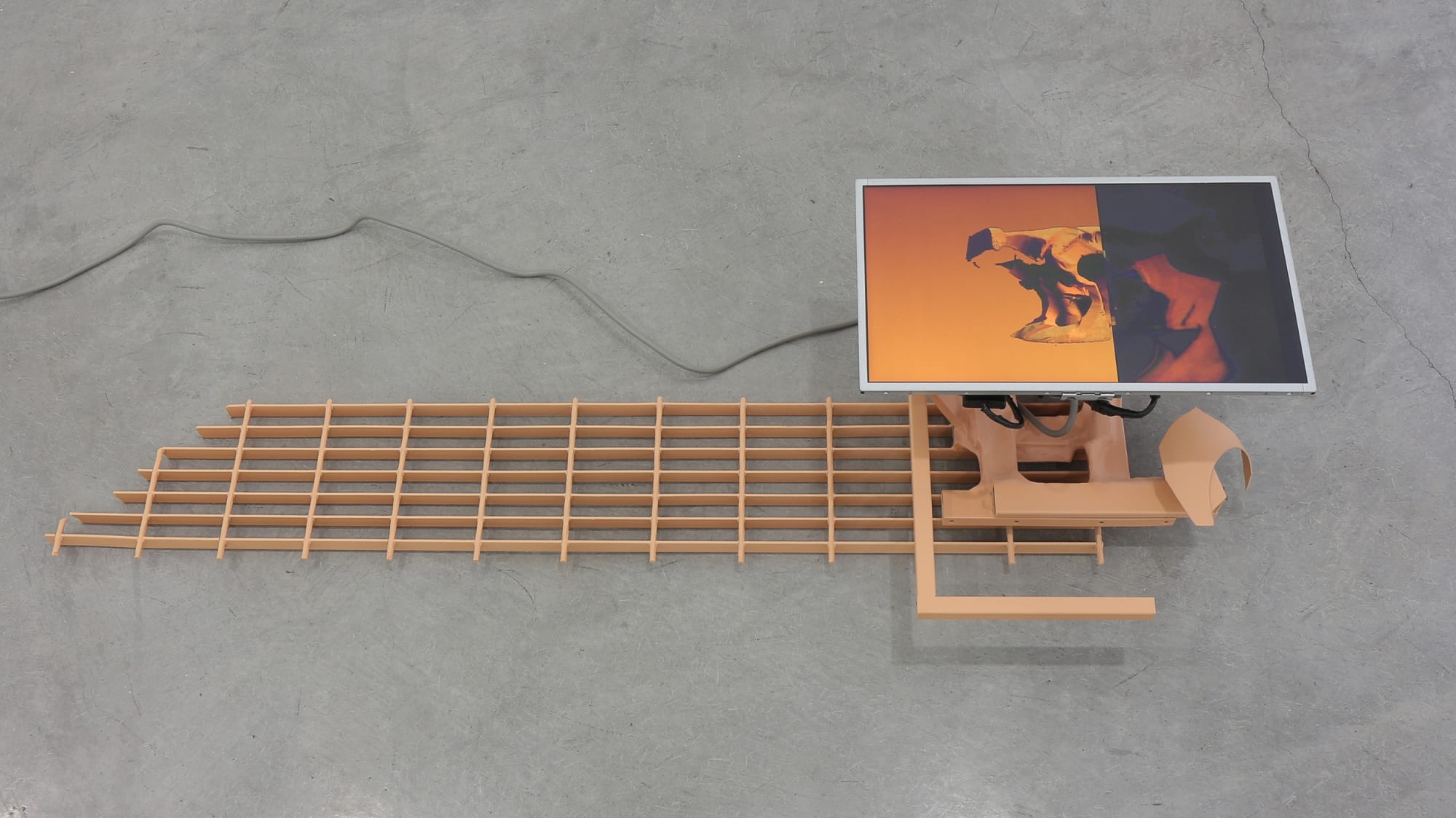 Nate Boyce Untitled (flesh tone), 2013 Steel, acrylic, HD video, electronics 10 x 57 x 18 in 25.4 x 144.78 x 45.72 cm