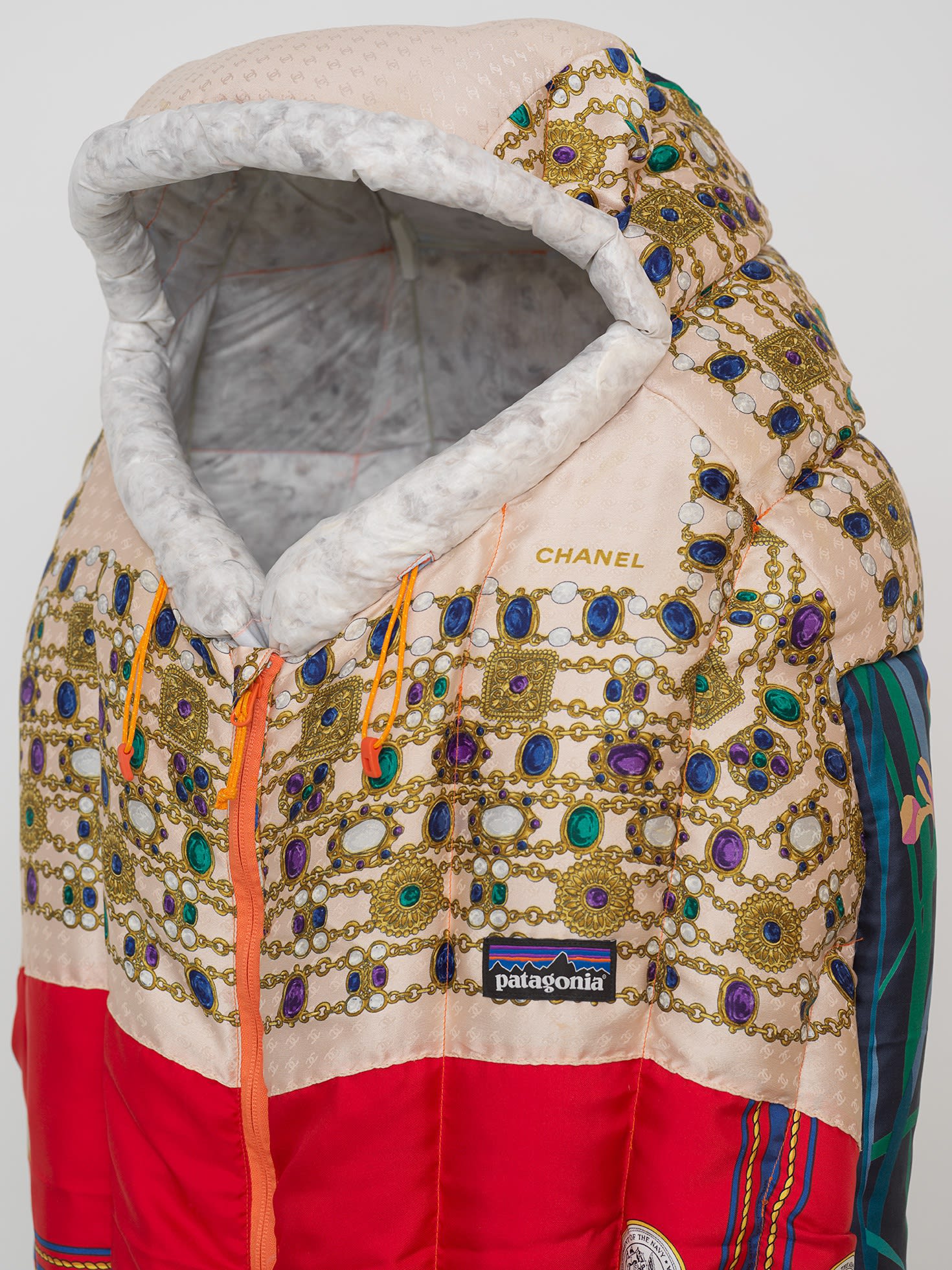 Simon Denny Remainder 2 (detail), 2019 Margaret Thatcher scarves, Patagonia 850 Down Sleeping Bag 30 F/-1 C - R parts, Ripstop Nylon, Down sourced from second hand San Francisco garments, carbon fibre, glass fibre, wood 82 5/8 x 21 5/8 x 15 3/4 in 210 x 55 x 40 cm