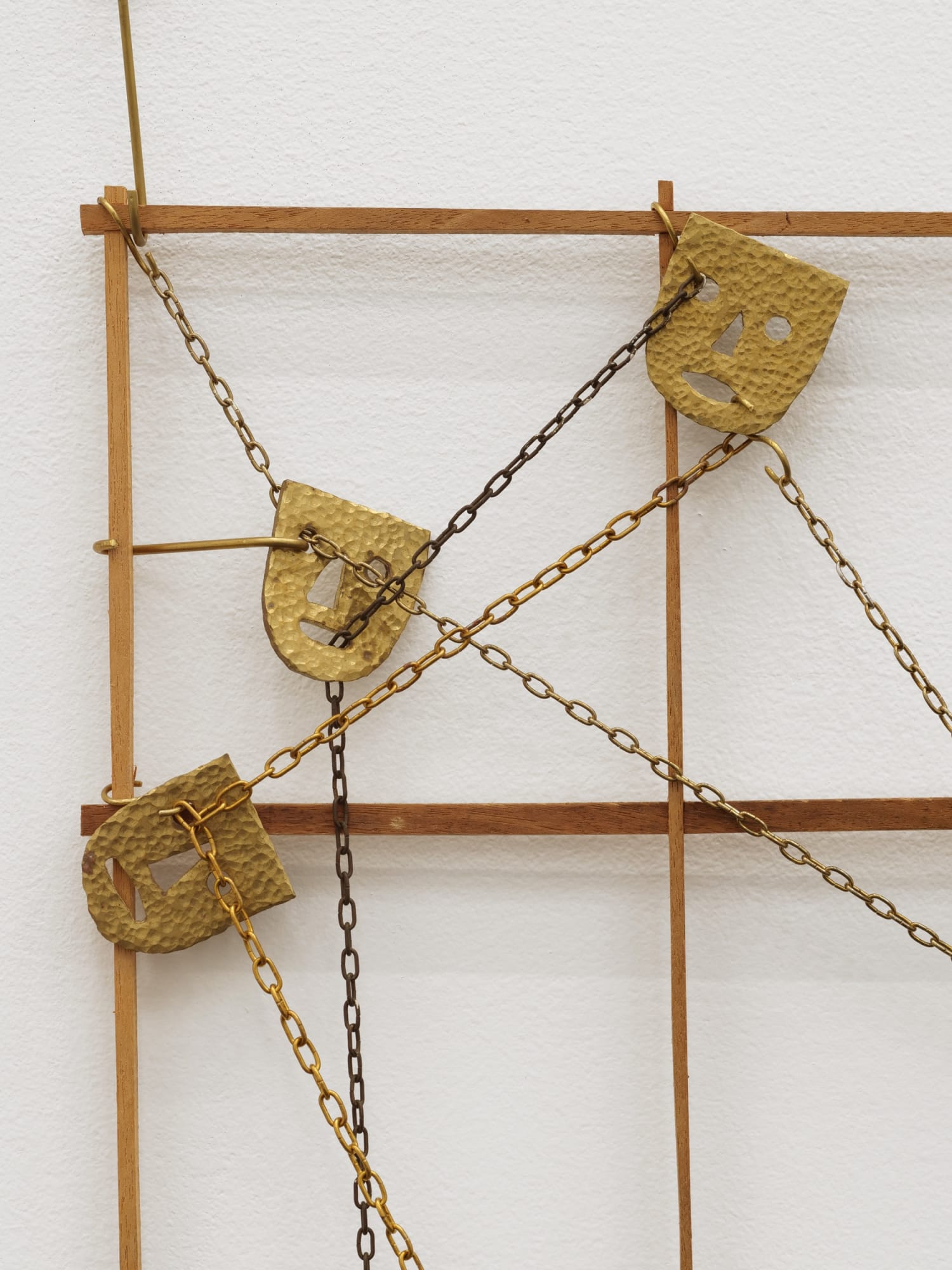 Will Rogan Squad (detail), 2016 Mahogany, brass, clock chain 24 x 24 x 1 in 61 x 61 x 2.5 cm