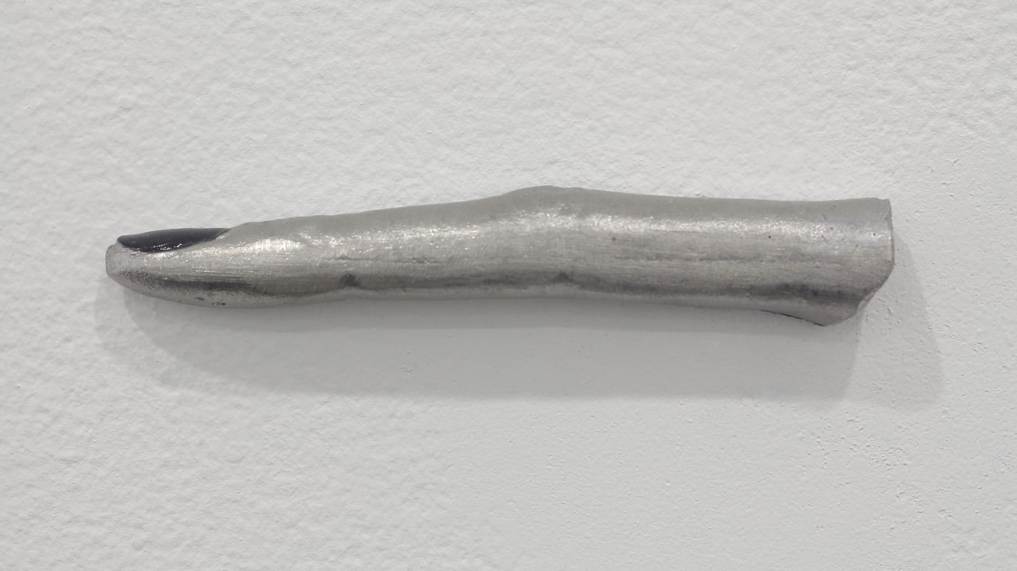 Alice Channer Very Dry Skin, 2013 Cast aluminum, nail polish, wall fixings 4 1/2 x 5/8 x 5/8 in 11.5 x 1.5 x 1.5 cm