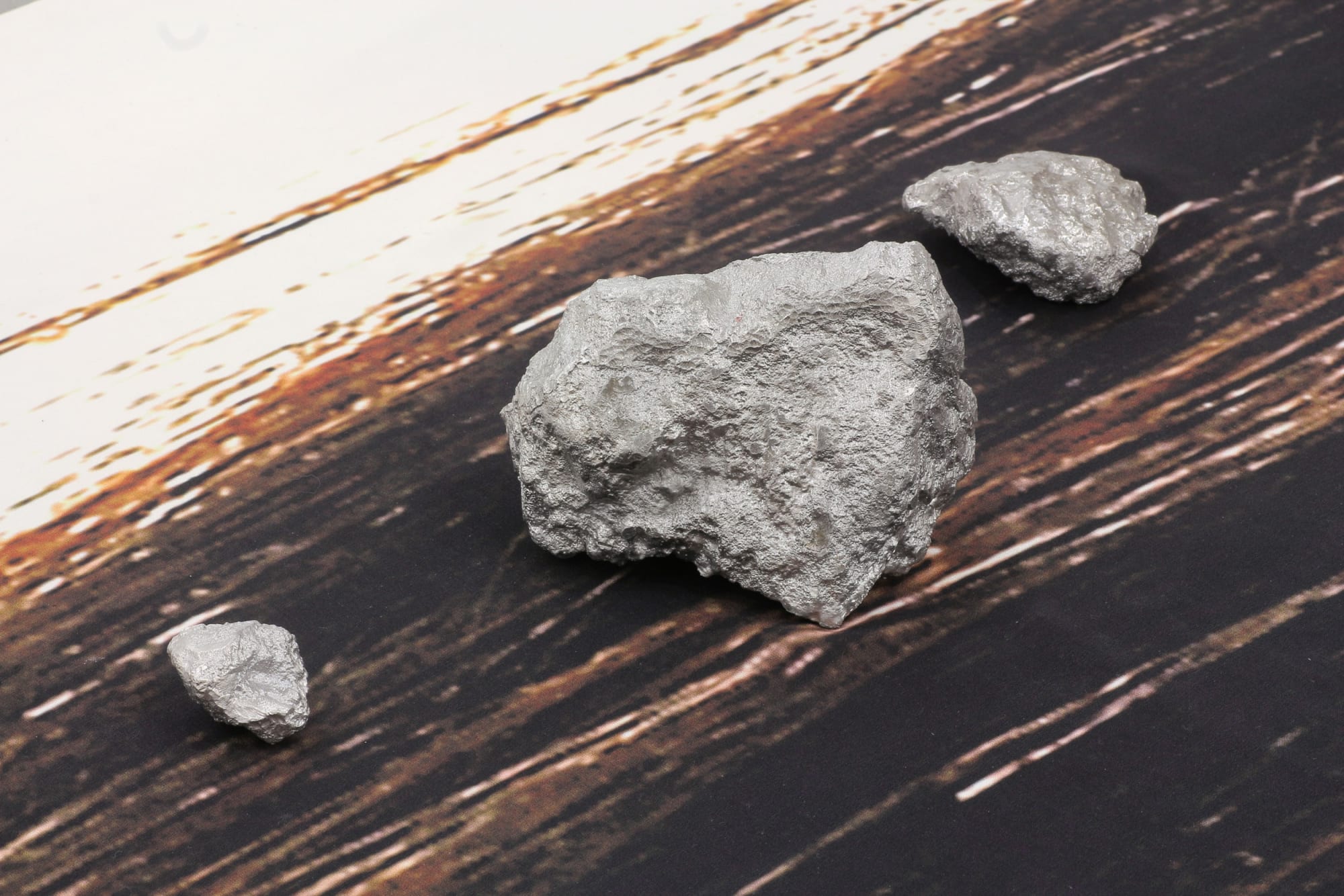 Alice Channer Body Fluids (detail), 2012 Digital print on heavy crepe de chine, cast aluminum, chrome bar 114 1/8 x 54 3/4 x 1 1/8 in 290 x 139 x 3 cm