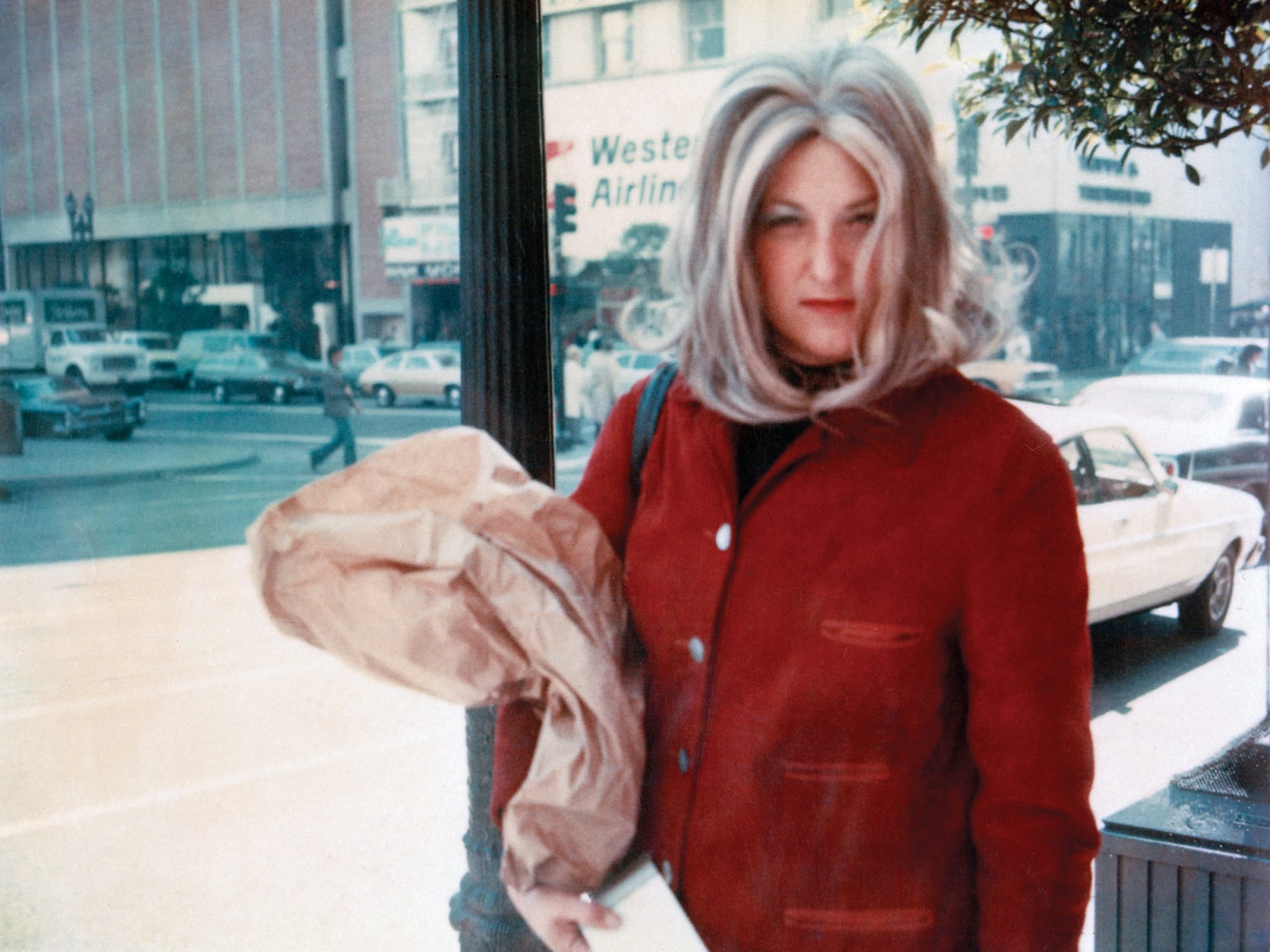 Roberta in Red Coat at Bus Stop, 1978