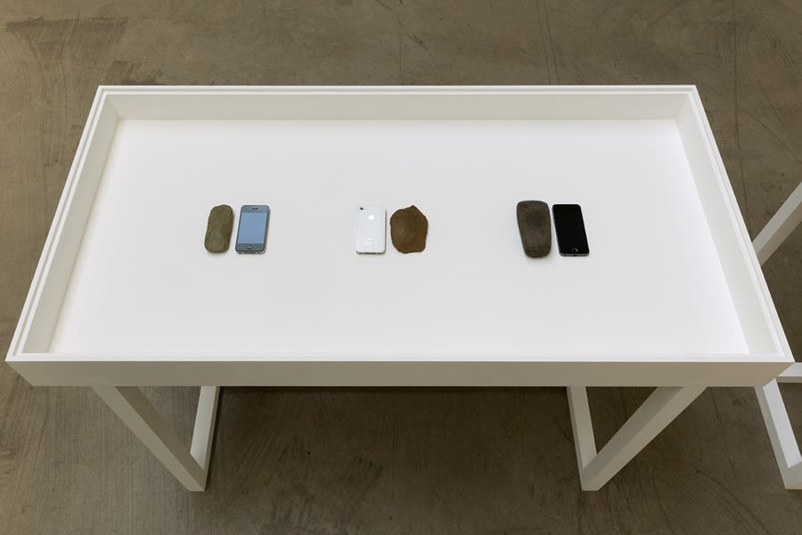 Exchange a mobile phone for a stone tool