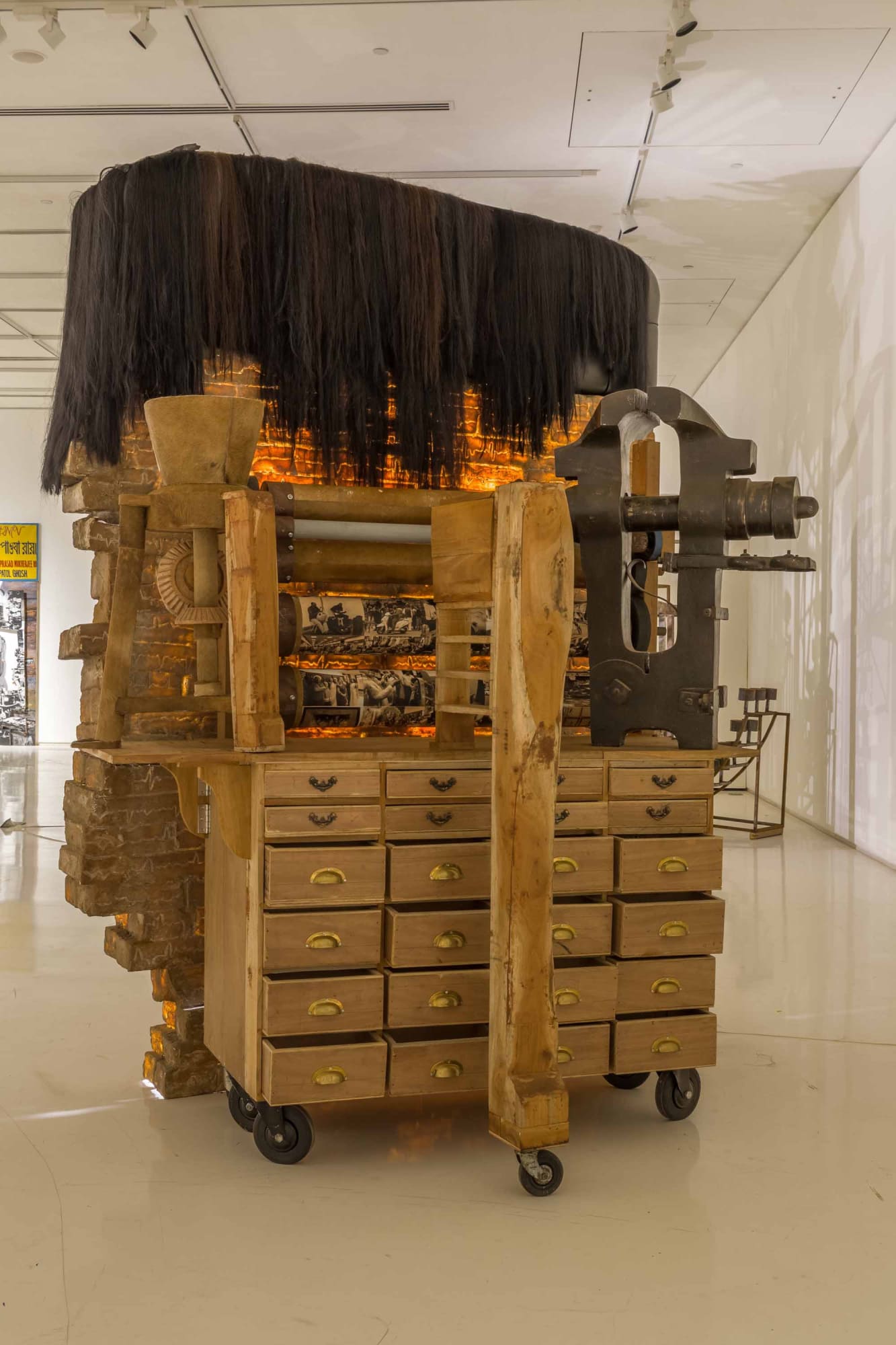 PROBIR GUPTA Archive (The Wall and The Museum) Fibreglass, leatherite, upholstery, false hair, LED lights, wood, steel, leather and photographs on archival canvas 260 x 210 x 145 cm. overall 102.5 x 83 x 57 in. Suite of 2 works