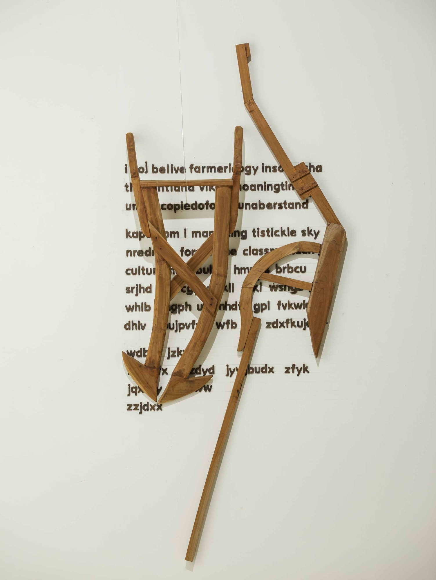PROBIR GUPTA Banal Letters, 2022 Wood and patinated brass Dimension variable