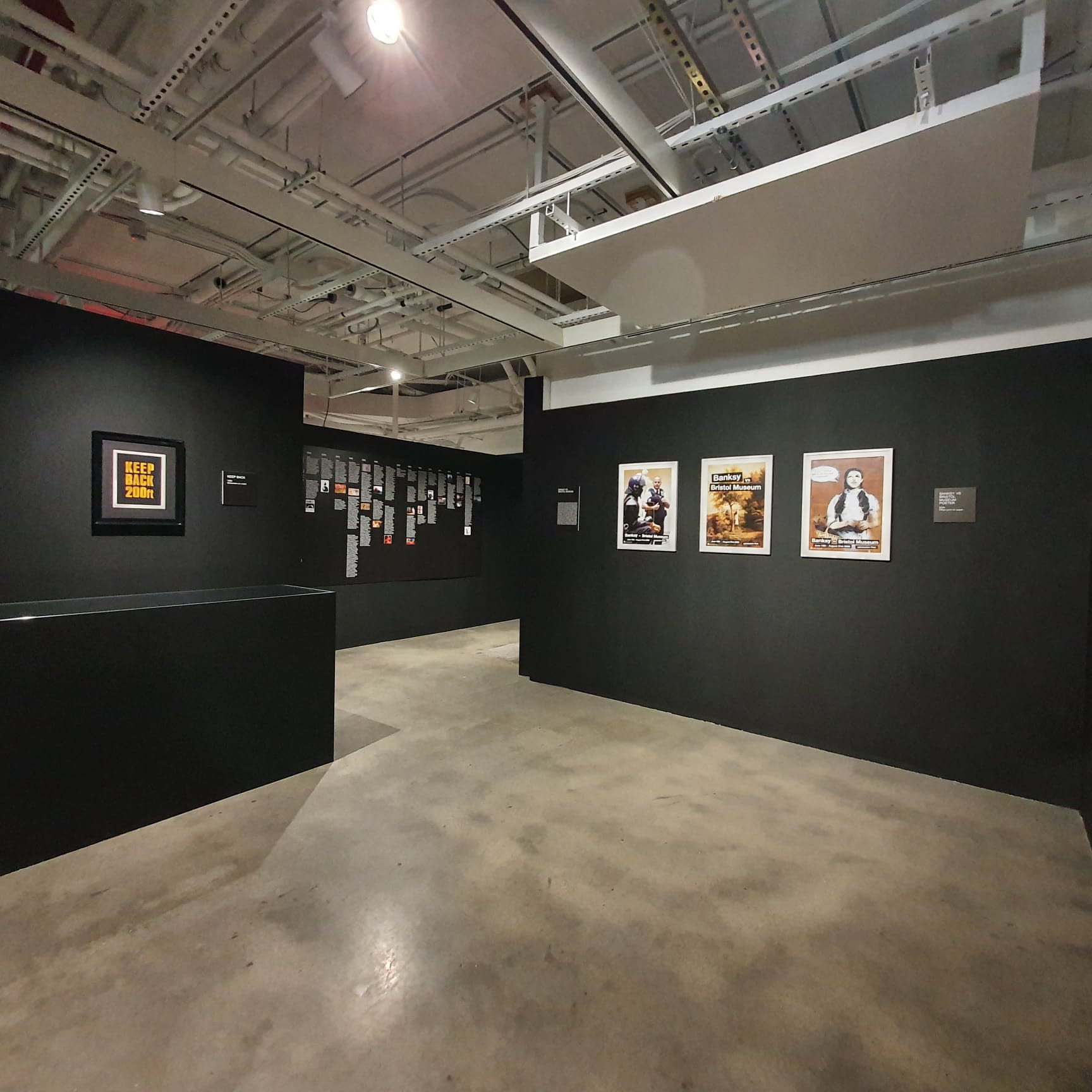 Banksy artworks hanging on wall