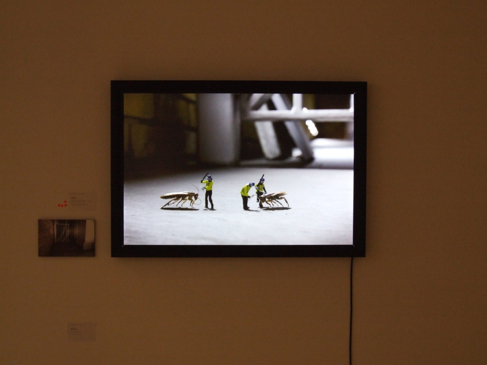 Slinkachu print hanging in exhibition at andipa gallery.