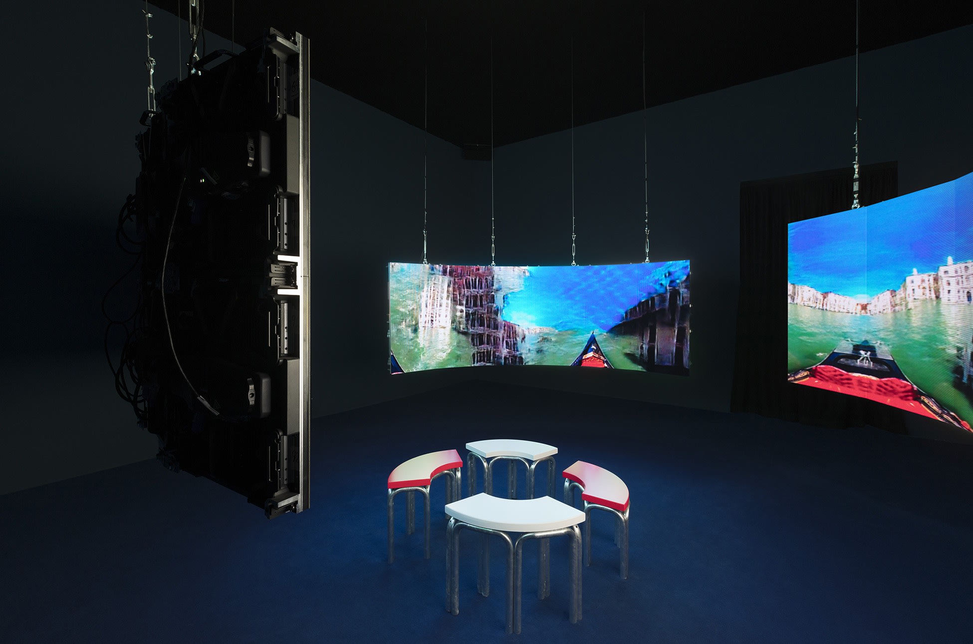 Hito Steyerl Leonardo's Submarine , 2019 Video installation, environment 3 channel HD video, color, sound, 9 minutes 30 seconds Environment: 3 curved screens made of LED panels, Dimensions variable Edition of 7, with 2 APs