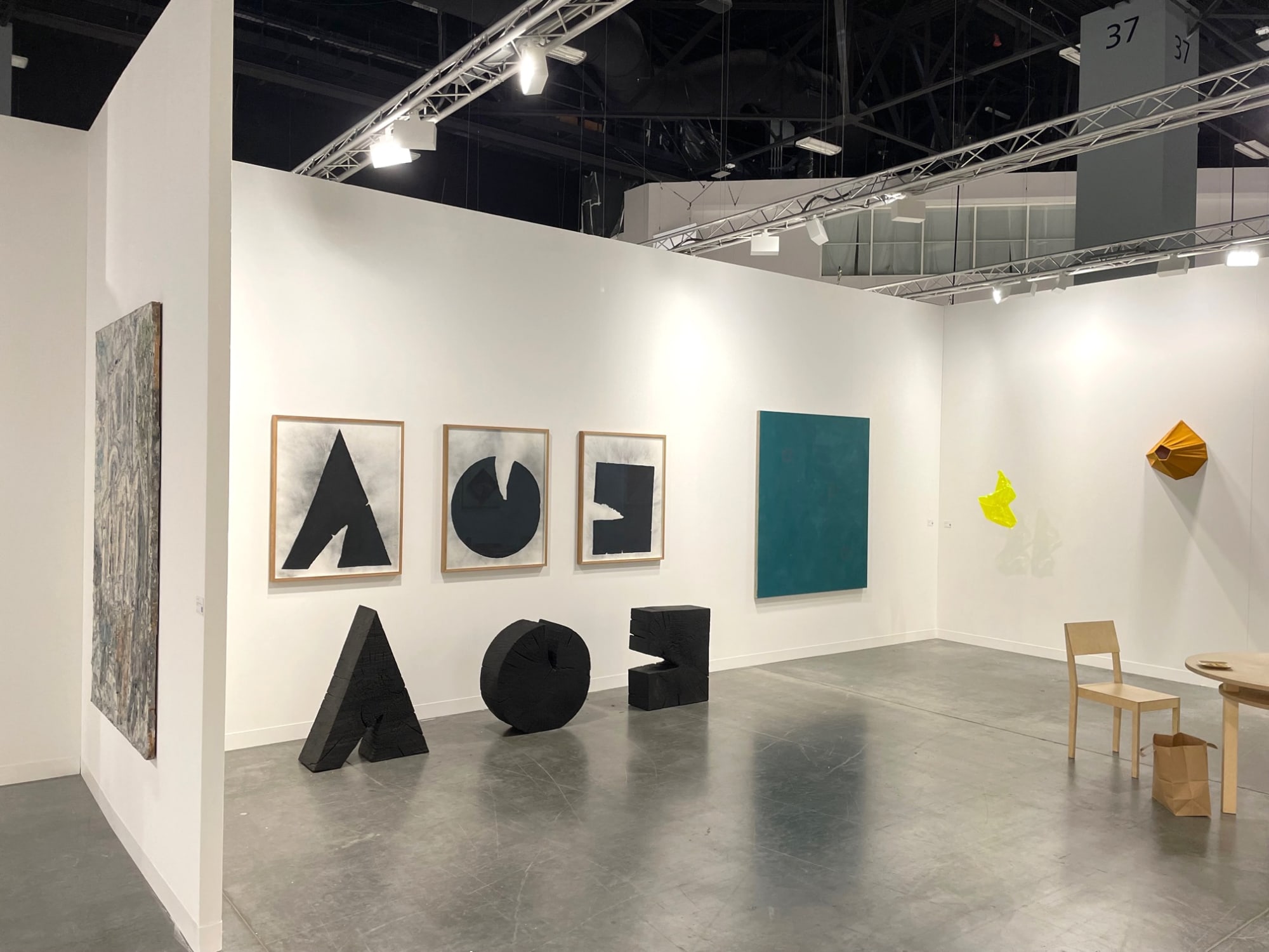 sculpture by David Nash Triangle, Circle, Square 2020 bronze & 3 stencil prints ed. 1/5 Triangle: 90 x 70 x 27 cm, Circle: 74 x 74 x 26 cm Square: 71 x 51 x 25 cm Stencil each: 100 x 80 cm and painting by Japanese painter Yuko Shiraishi Signal of flow 202