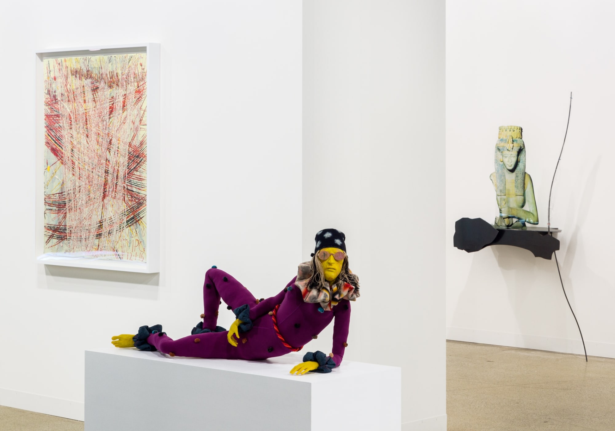 Installation view of Art Basel. featuring many artists in the gallery's program, among them Nicole Eisenman, Alessandro Pessoli, and Sasnal.