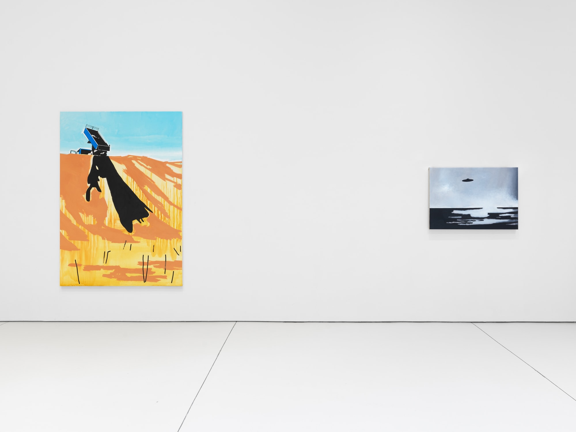 Installation view of WIlhelm Sasnal's show at the gallery in 2021 featuring new paintings on the first and second floors of the gallery. One orange and one gray painting.