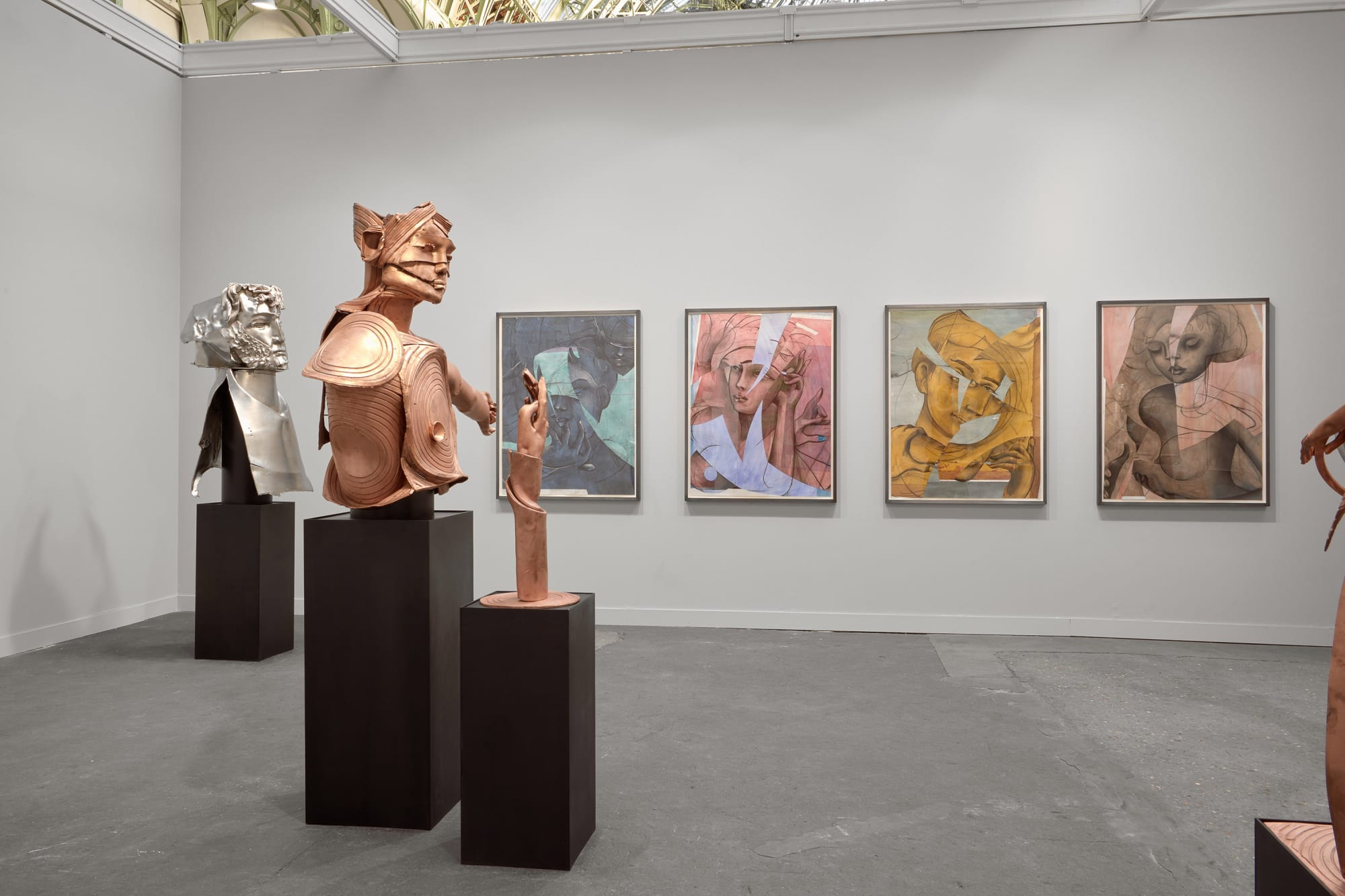Matthew Monahan solo booth at FIAC filled with a variety of sculptures and paintings.