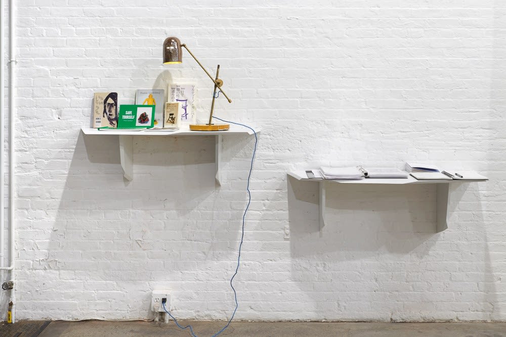 Installation view of Francis Upritchard and Martino Gamper's collaborative show. Floating shelves with gallery materials and an Upritchard lamp.