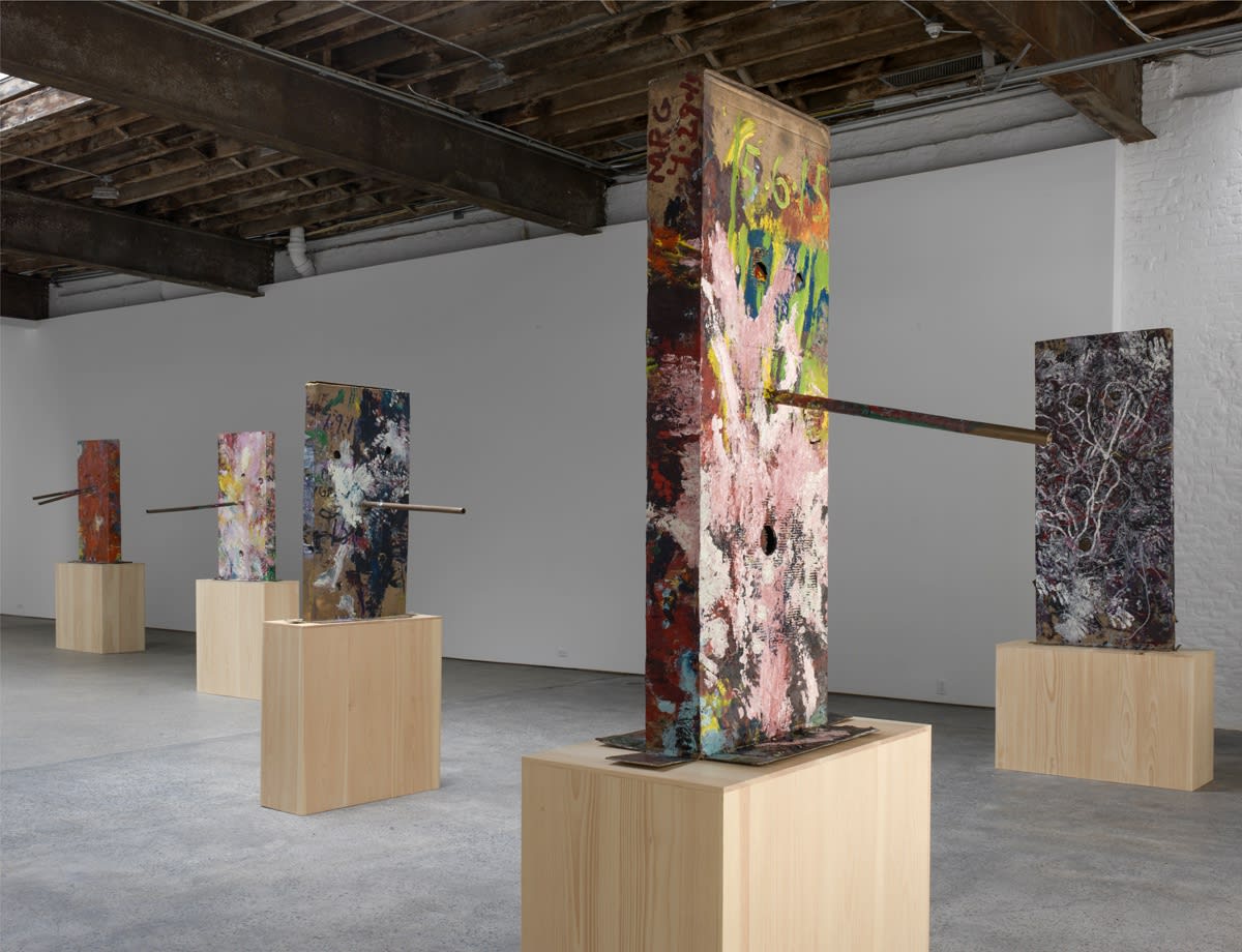 Installation view of Mark Grotjahn's fourth solo show at Anton Kern Gallery. View shows the protruding sculptural elements in each work.