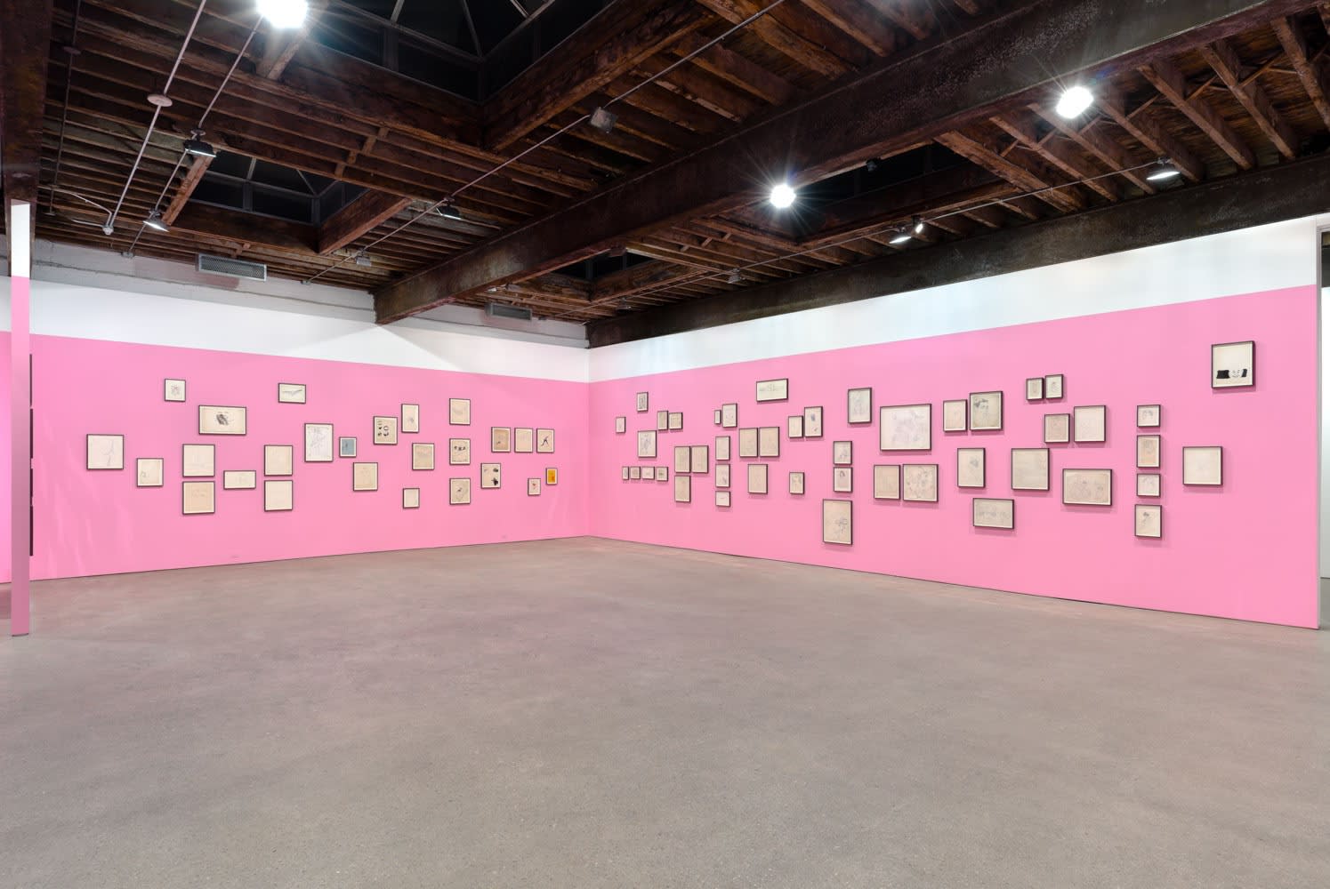 Installation view of Andy Warhol's solo show, featuring 170 of the artist's drawings. A corner of the show, featuring more drawings.