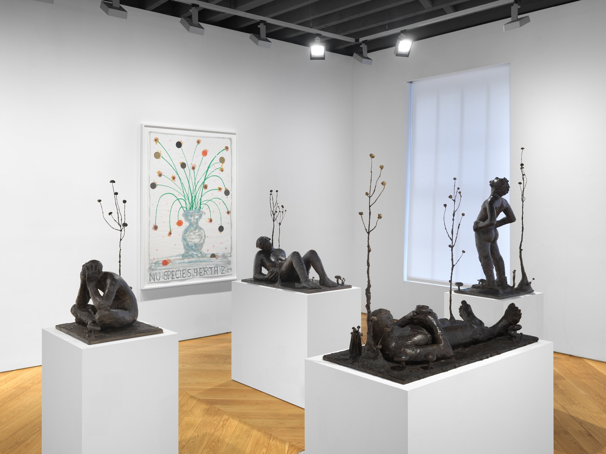 Installation view of Nicole Eisenman's exhibition at the gallery in early 2021 of maquettes and prints. In this photo, many of Eisenman's sculptures are featured as well as a pulp drawing titled "Nu Species 4 Erth 2."