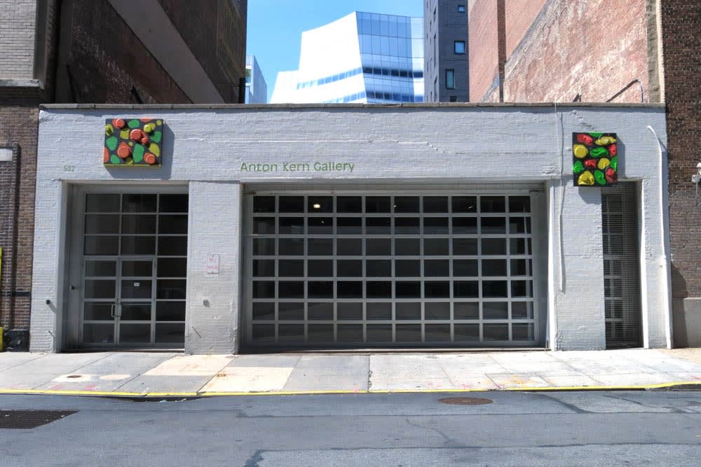 Installation view of the Matthew Higgs-curated show, Displayed. The exterior of the gallery, featuring two works by Chris Martin.