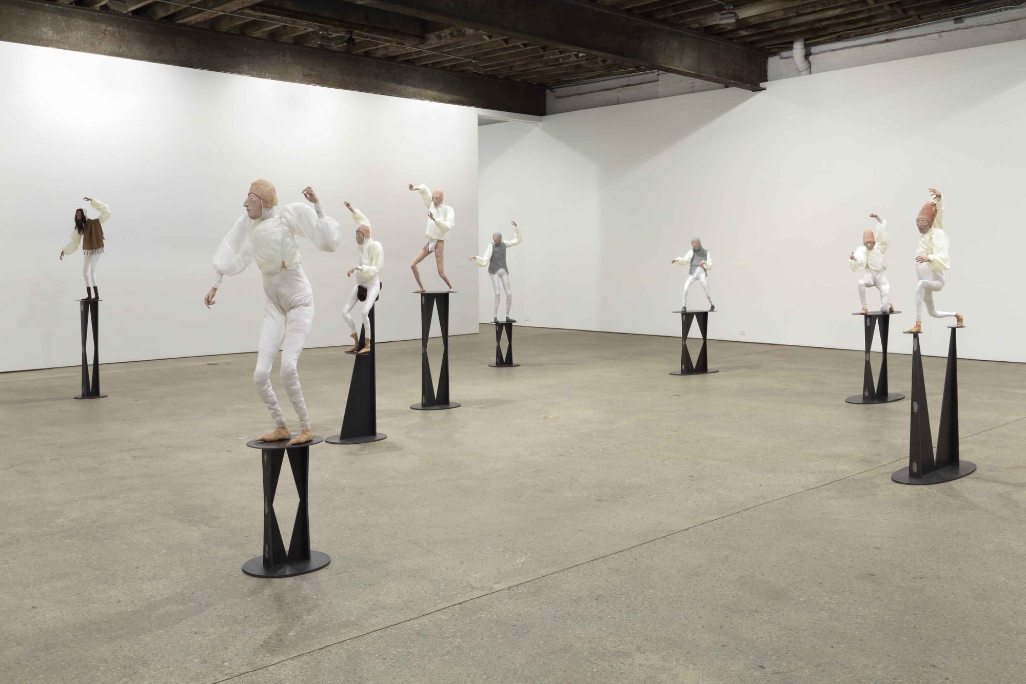 Installation view of Francis Upritchard's debut New York gallery show, featuring figurative and ritualistic sculptures as well as a collection of pots. Francis' figures.