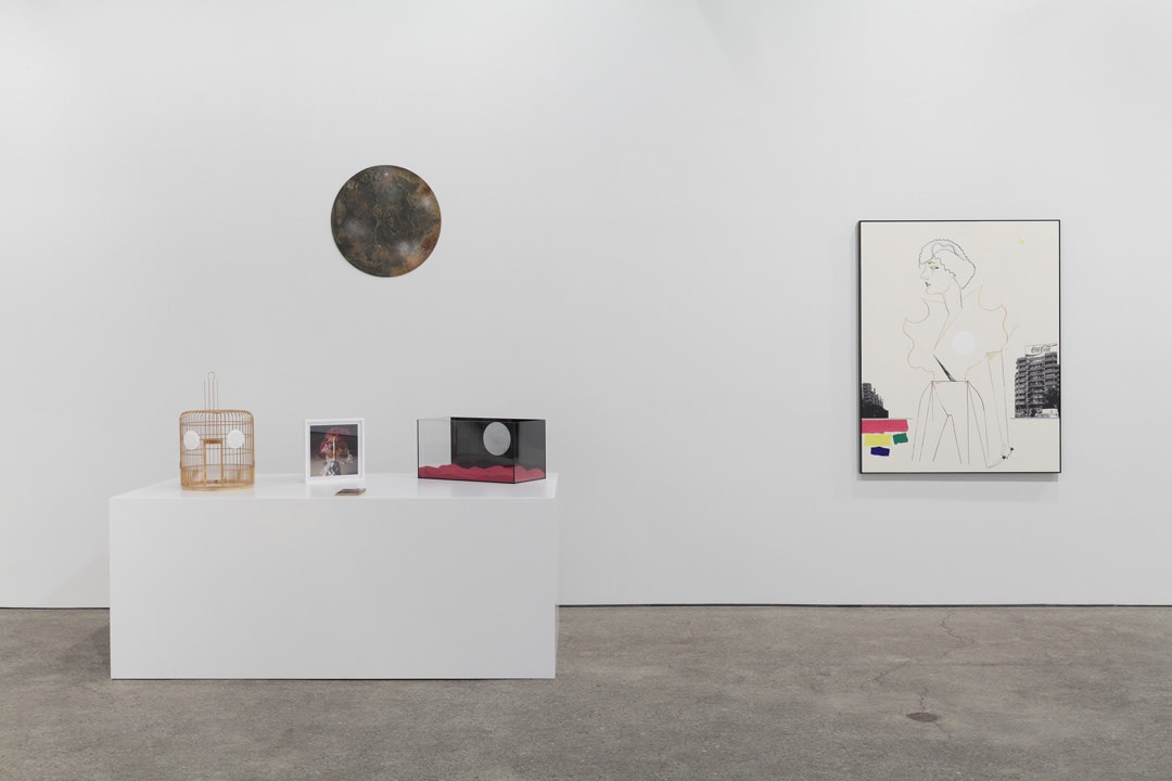 Installation view of Lothar Hempel's ninth solo show, featuring sculptures, paintings, photomontages, and seven collages. A few works shown here.