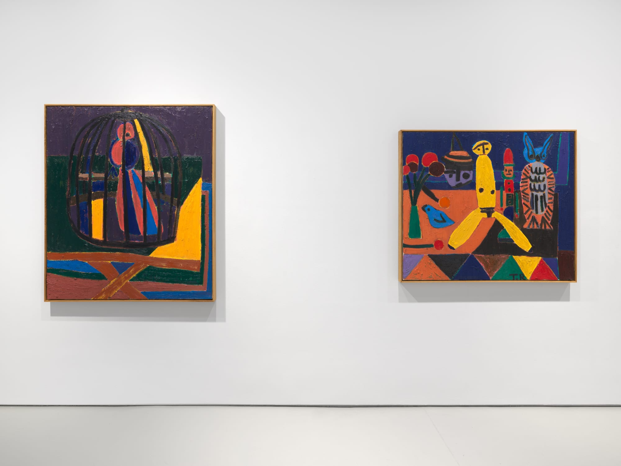 Installation view of Tal R's first exhibition with the gallery featuring paintings and sculptures. This shot features two paintings.