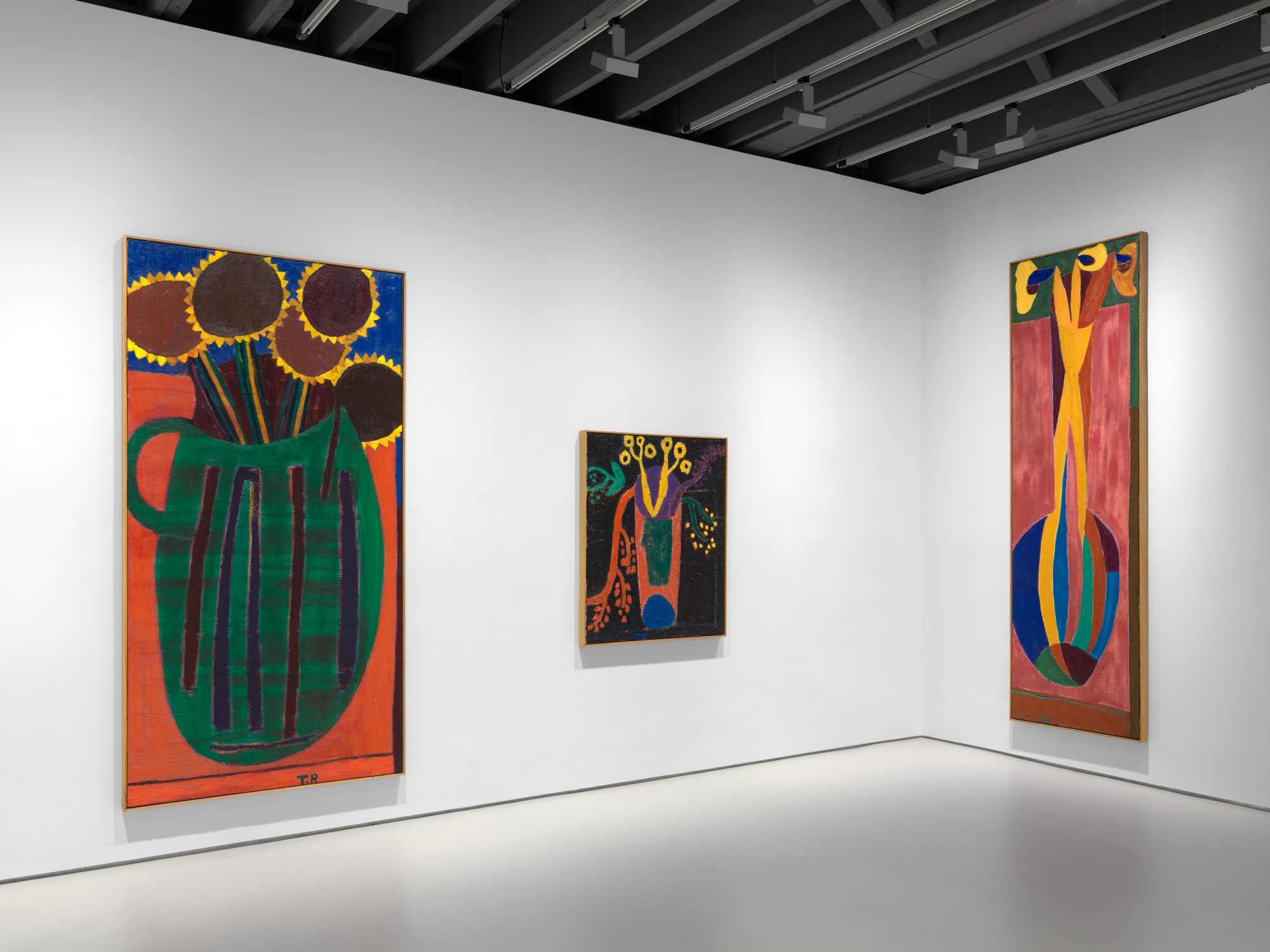 Installation view of Tal R's first exhibition with the gallery featuring paintings and sculptures. Three paintings shown.