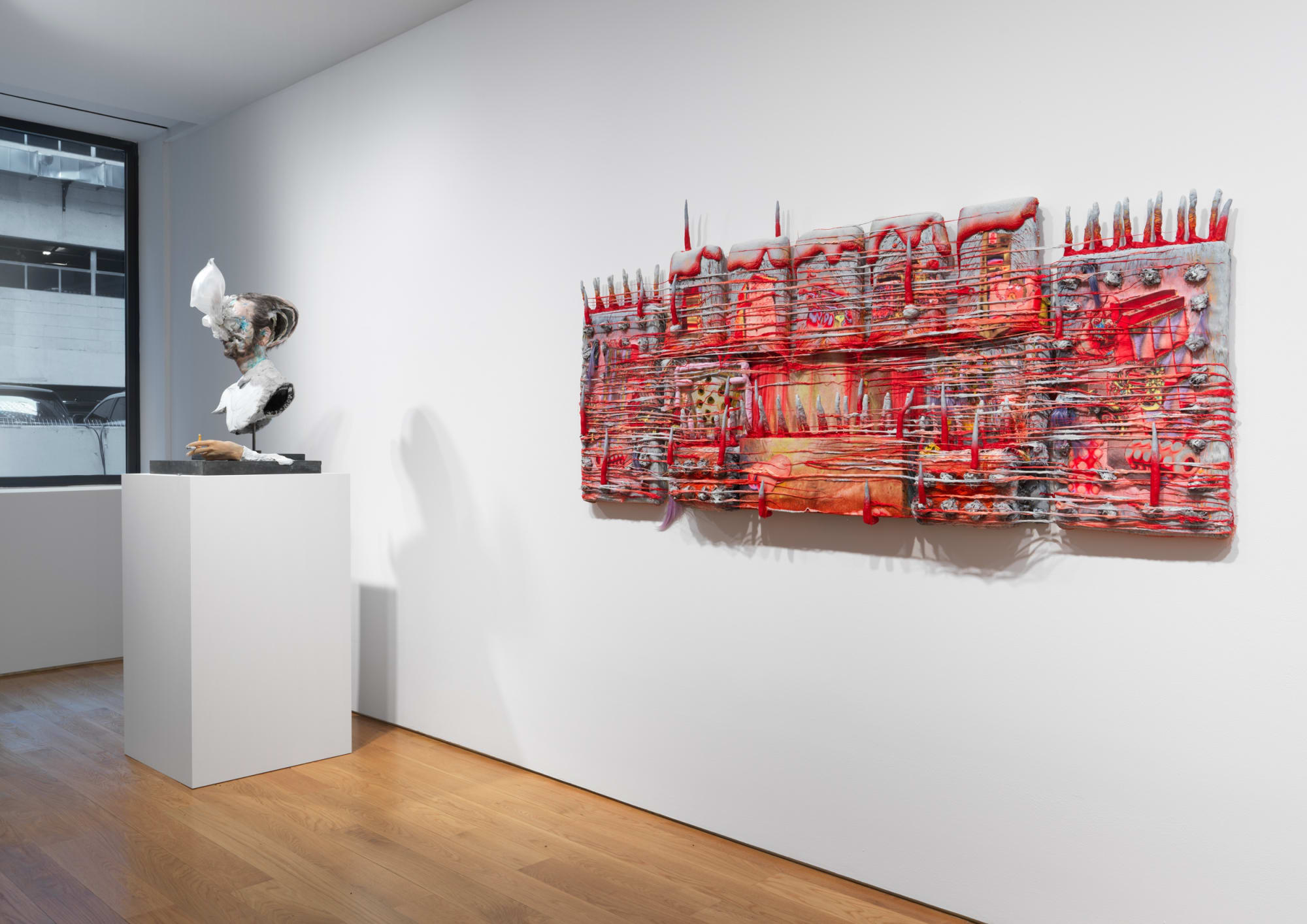 Group exhibition WirrWarr installation shots featuring works by gallery artists and others. David Altmejd, John Bock, and others are shown. Another view of Barricade.