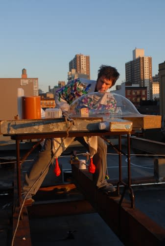 Installation view of John Bock's solo roof show. Bock at his own "Bock Bar" on the Kern rooftop.