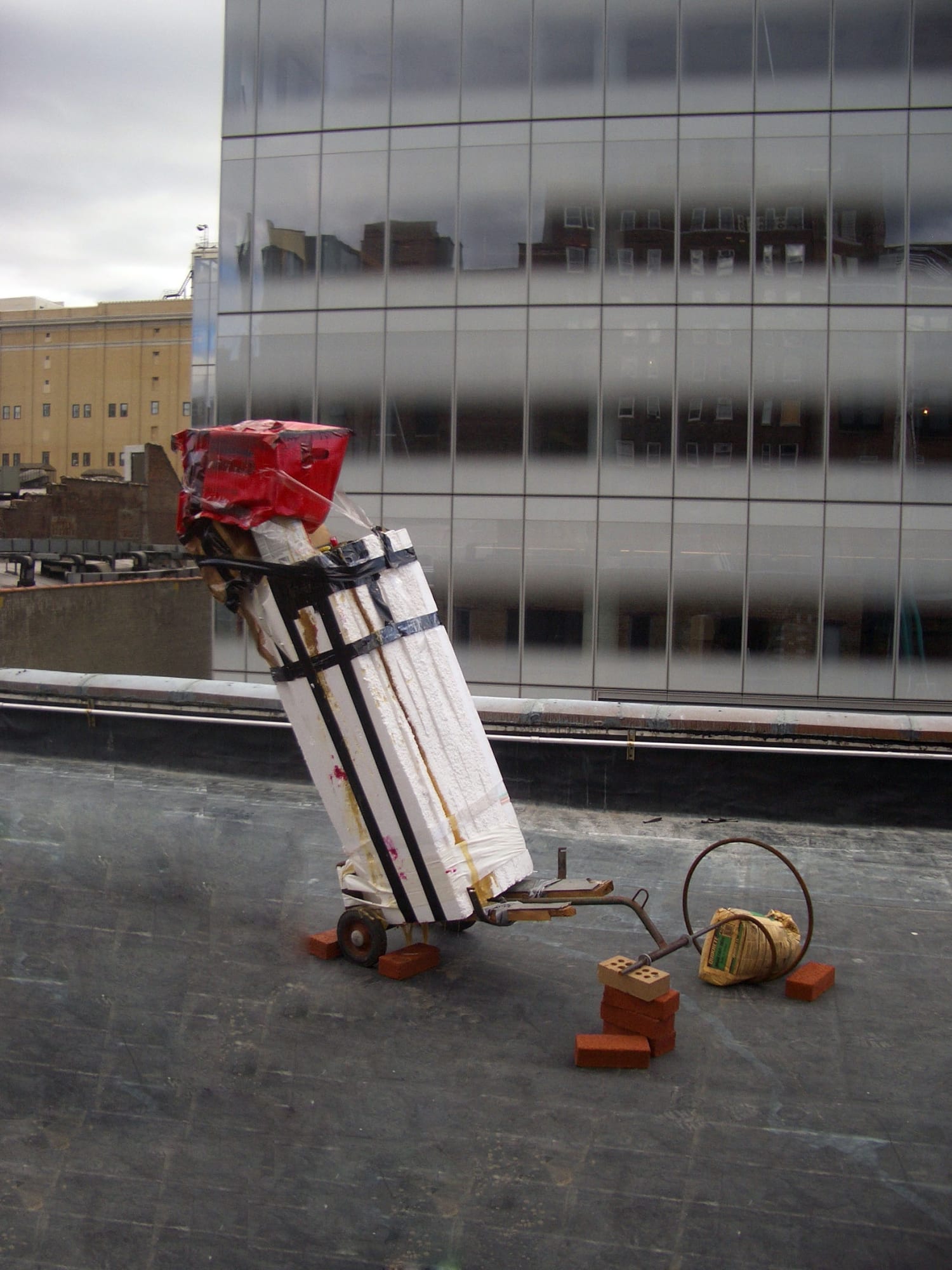 Installation view of John Bock's solo roof show. Bock's rocket.