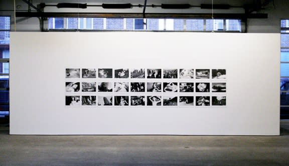 Installation view of Araki's rarely seen body of work. One wall of the gallery.