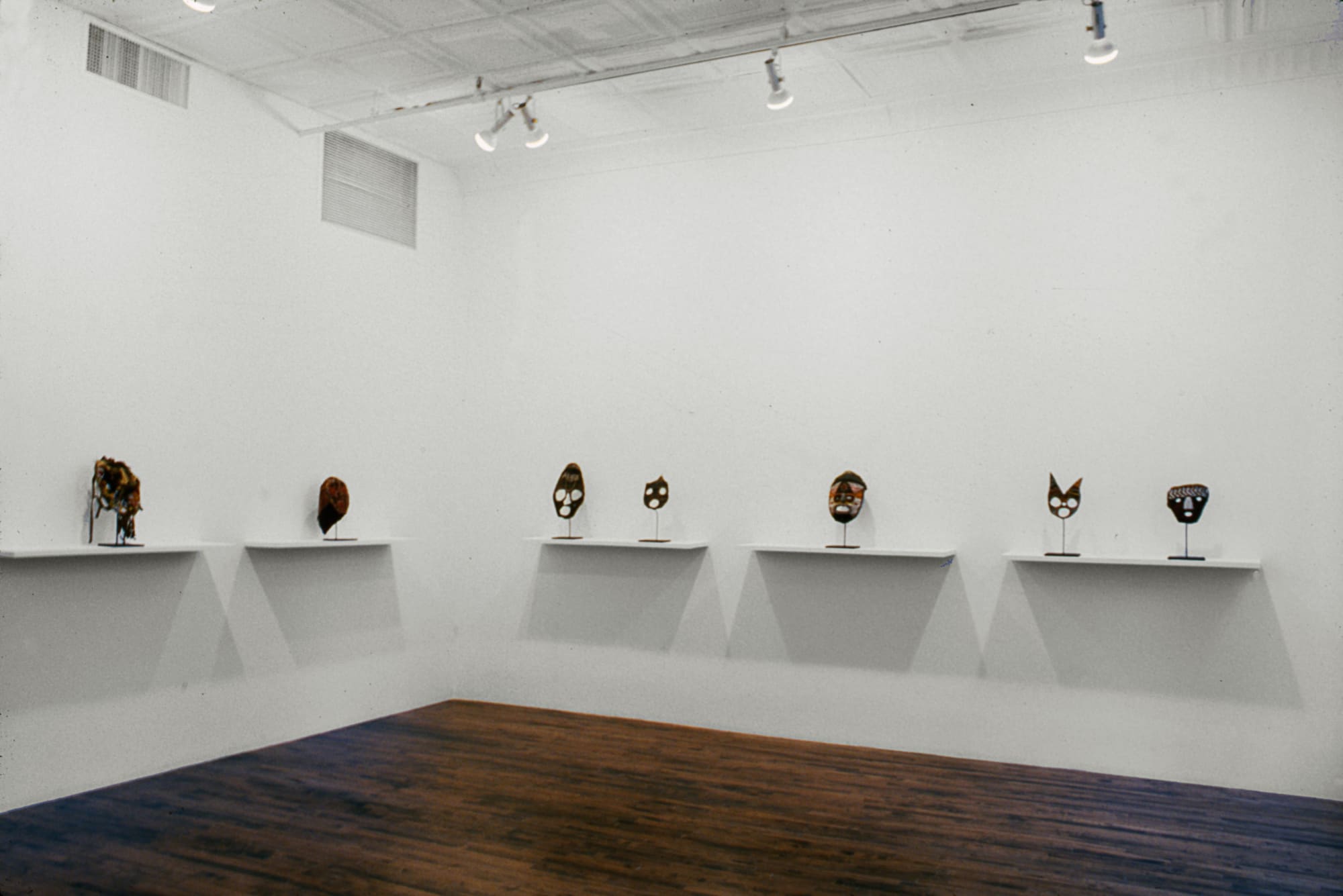 Installation view of Matthew Monahan's first show at Anton Kern Gallery, featuring drawings from the young artist coupled with masks originating from the Tabwa Tribe in Zambia. A few more masks.