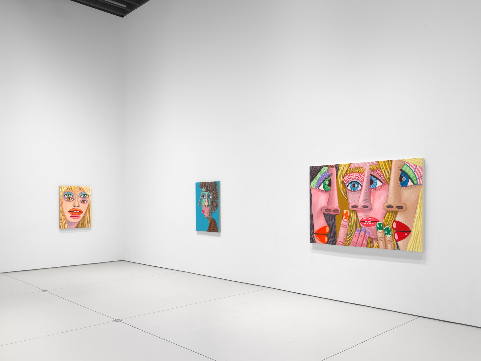 installation view of Brian Calvin's Waiting featuring paintings with hyperbolic color, mosaic eyes, and more. This image showcases Calvin's work "Committee."