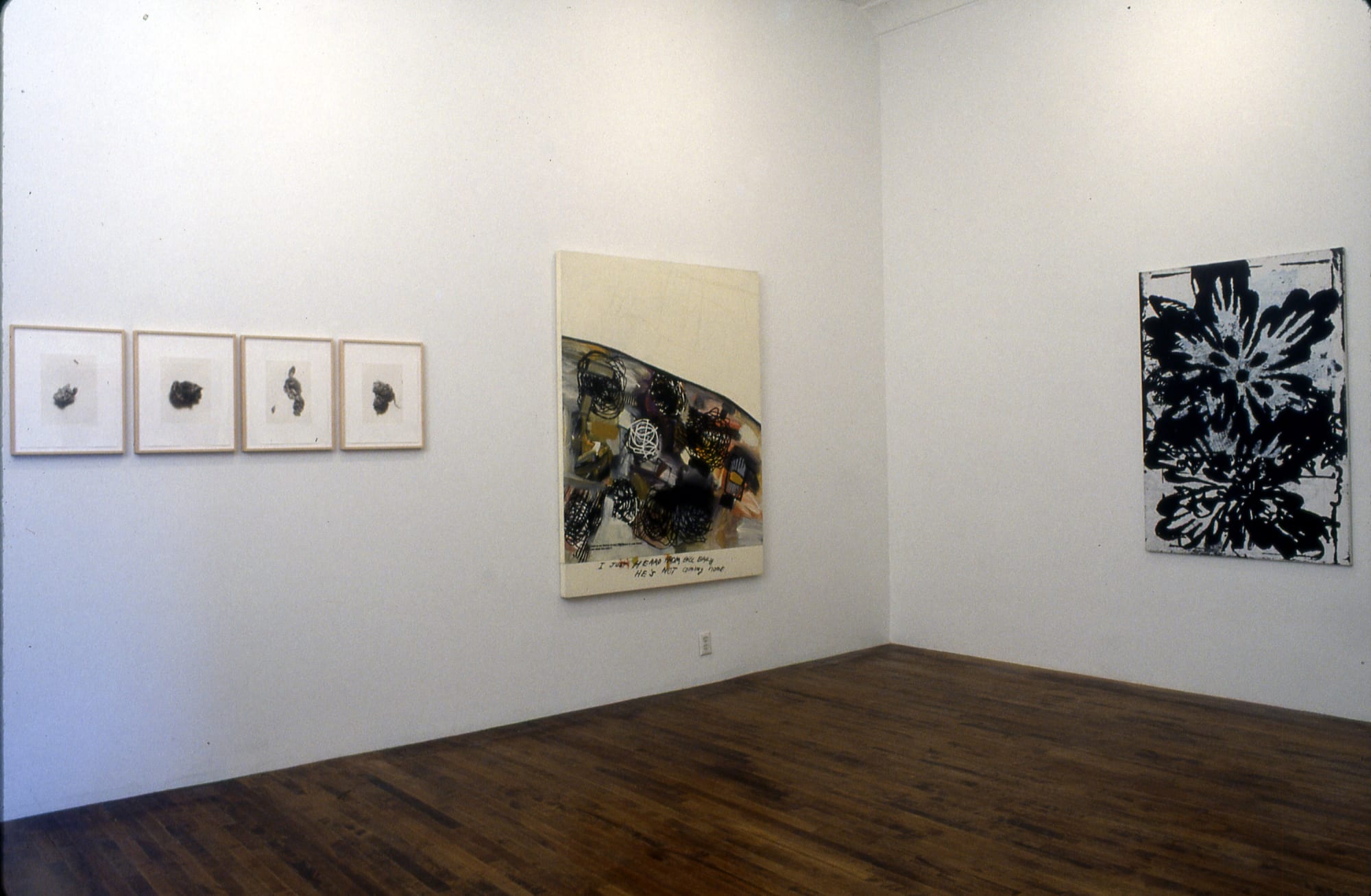Installation view of 1997 group show titled Painting, Photography, and Drawing, featuring many artists. A few works featured.