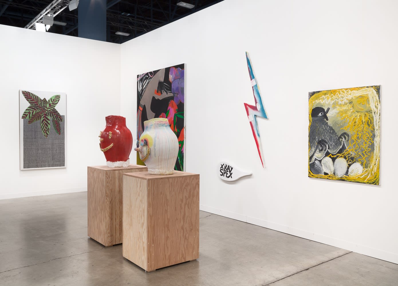 Installation view of Art Basel Miami 2015. Another angle of McCarthy's sculptural-faces.