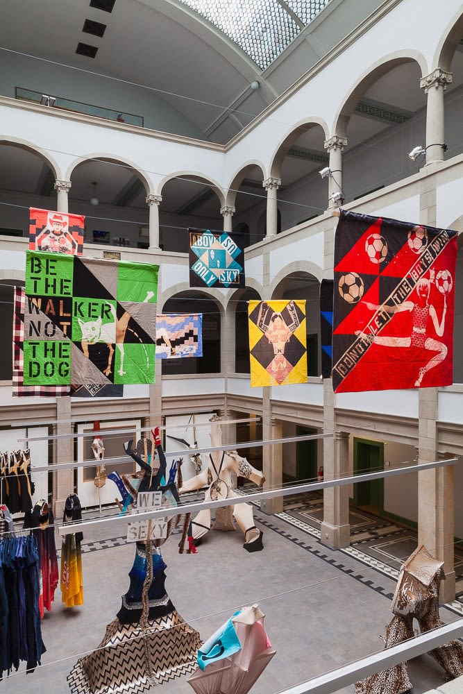 Installation view of Lara Schnitger's show at Basel Parcours, featuring a large body of works as well as a procession through Mezzeplatz. Hanging works featured.
