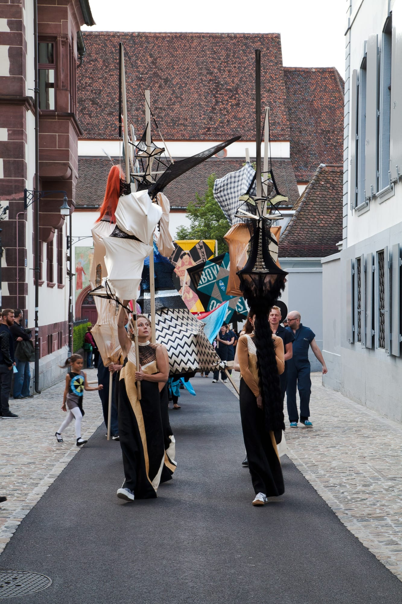 Installation view of Lara Schnitger's show at Basel Parcours, featuring a large body of works as well as a procession through Mezzeplatz. The collection of slut-sticks are marched down the streets of Basel.