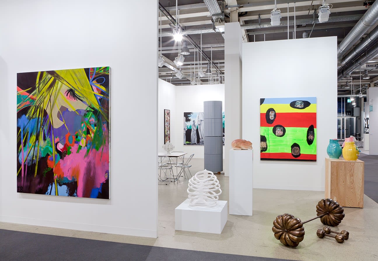 Installation view of Anton Kern Gallery's booth at Basel 2014. Ellen Berkenblit's work featured on the exterior of the booth.