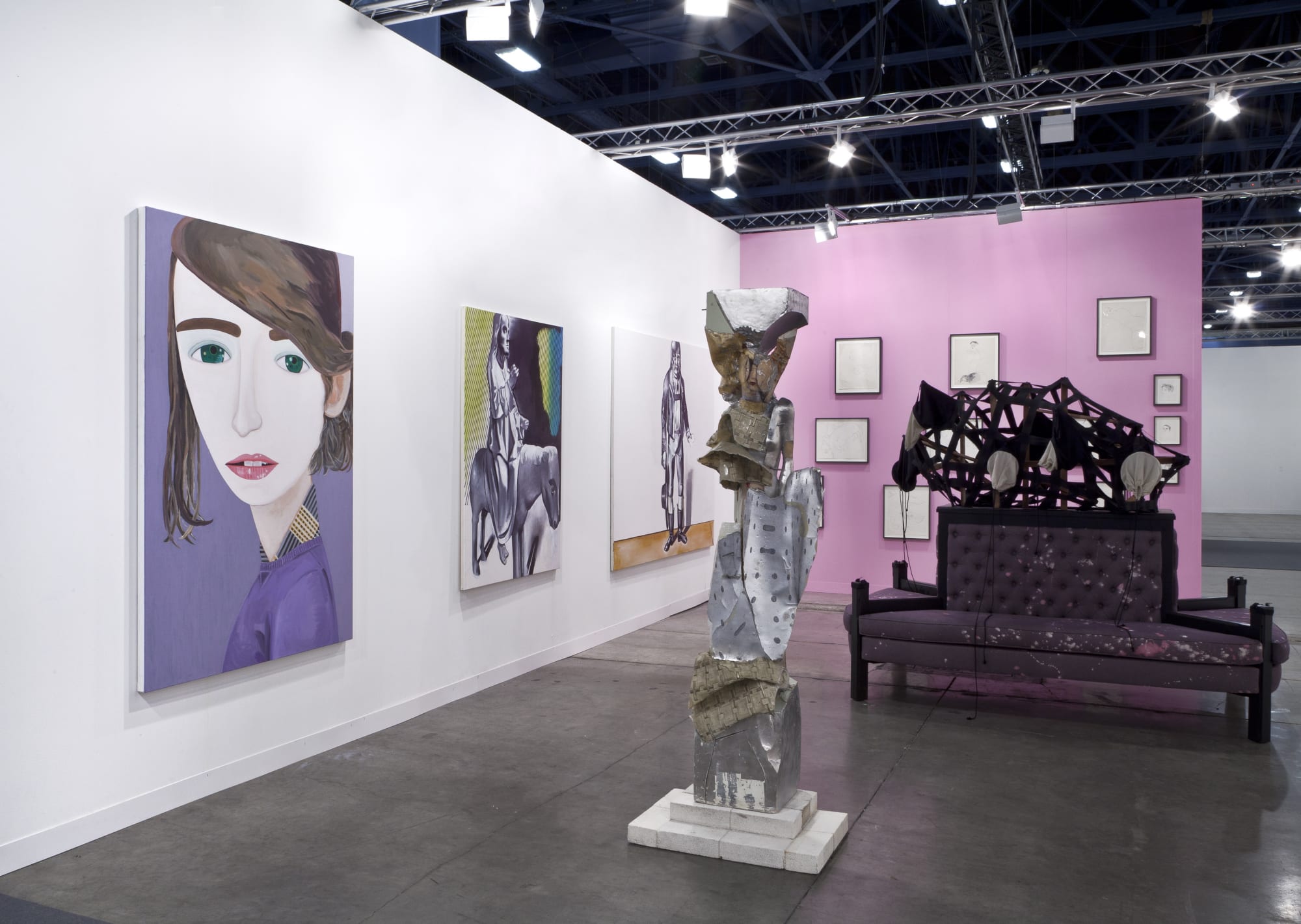 Installation view of the AKG booth at Art Basel Miami 2014. Brian Calvin, Wilhelm Sasnal, Matthew Monahan, and Lara Schnitger represented with the pink Andy Warhol wall in the background.