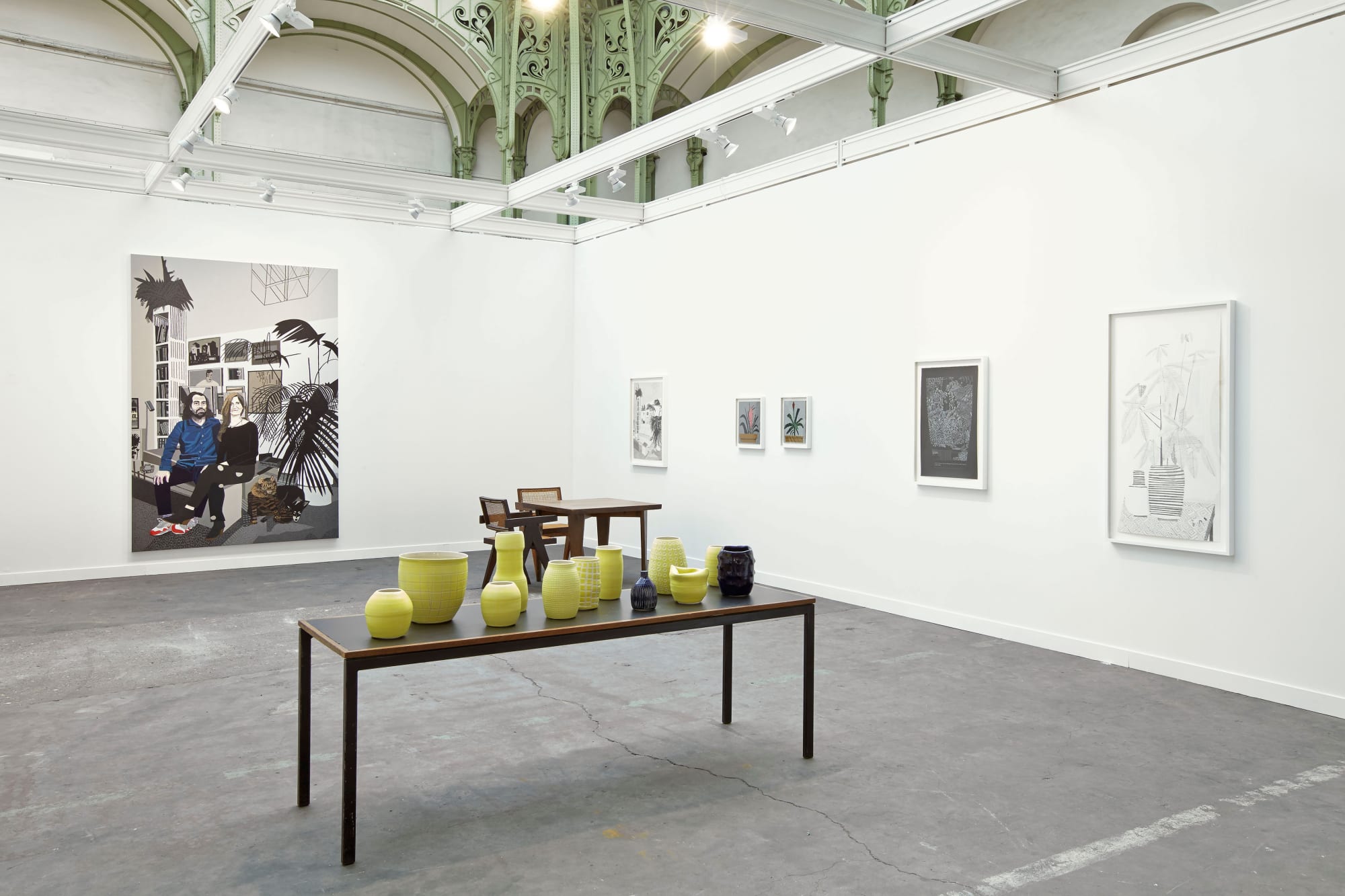 Installation view of Anton Kern Gallery's booth at FIAC 2014 featuring ceramics from Shio Kusaka and painted works by Jonas Wood. Kusaka's pots the physical center of the show.