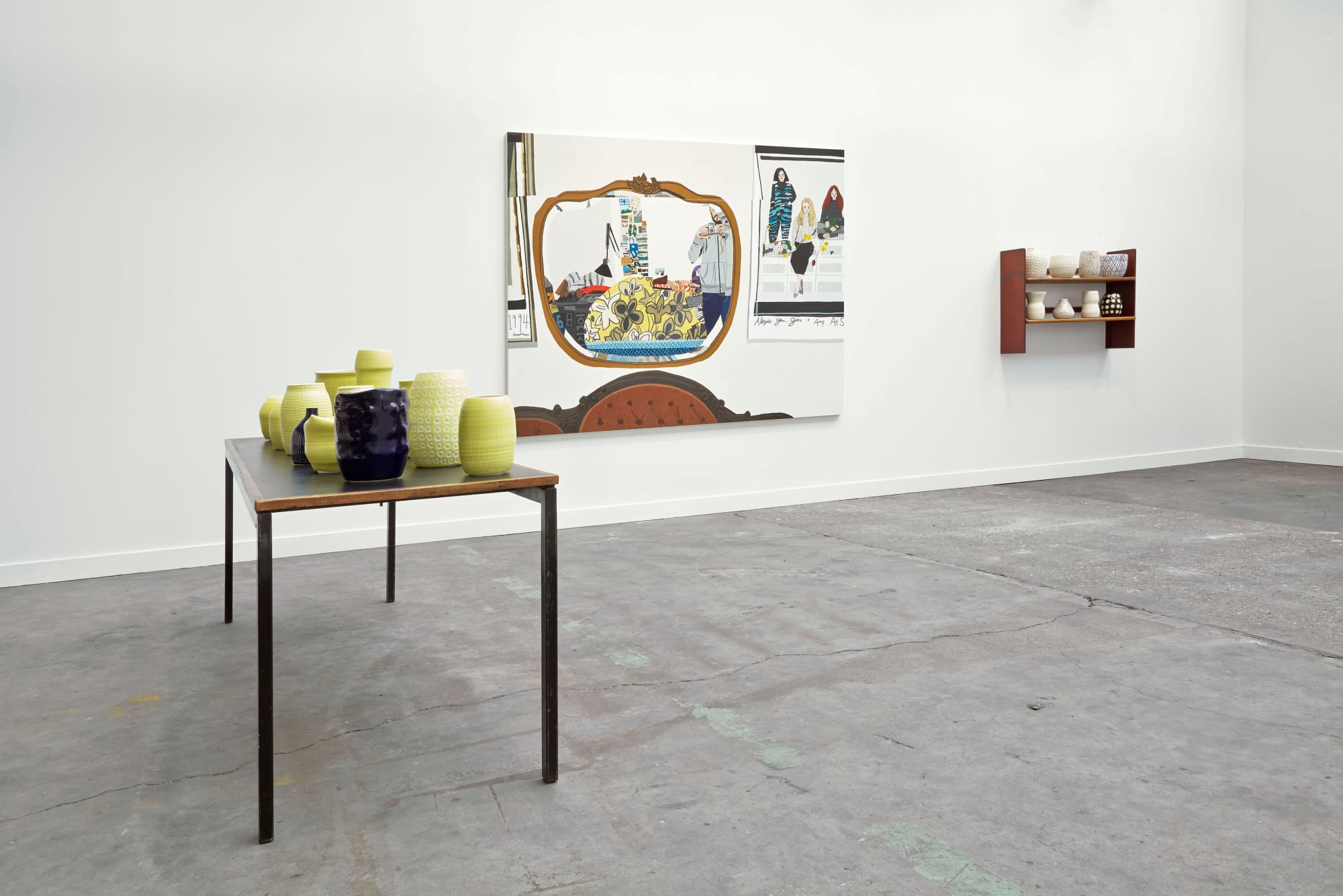 Installation view of Anton Kern Gallery's booth at FIAC 2014 featuring ceramics from Shio Kusaka and painted works by Jonas Wood. A few works featured.