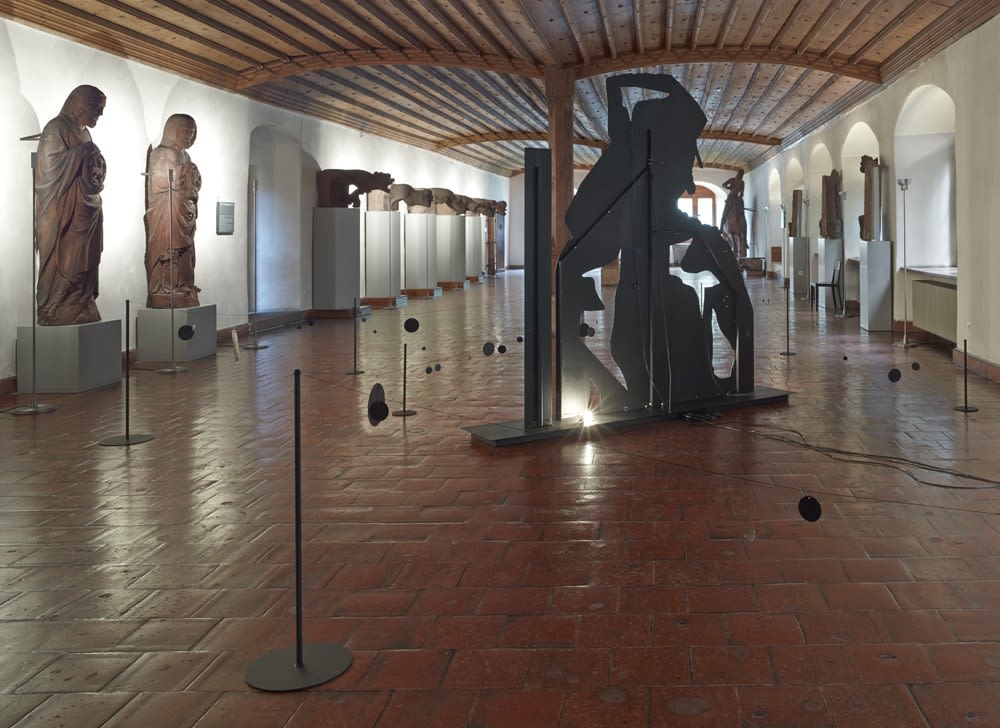 Installation view of Lothar Hempel's show at Art Basel Parcours 2013. View of the long hall where Hempel exhibited.