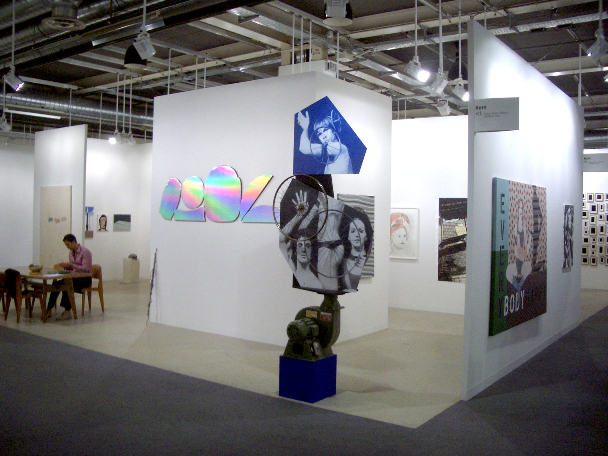 Installation view of the AKG booth at Basel 2007, featuring sculptural works by Jim Lambie and Lothar Hempel.